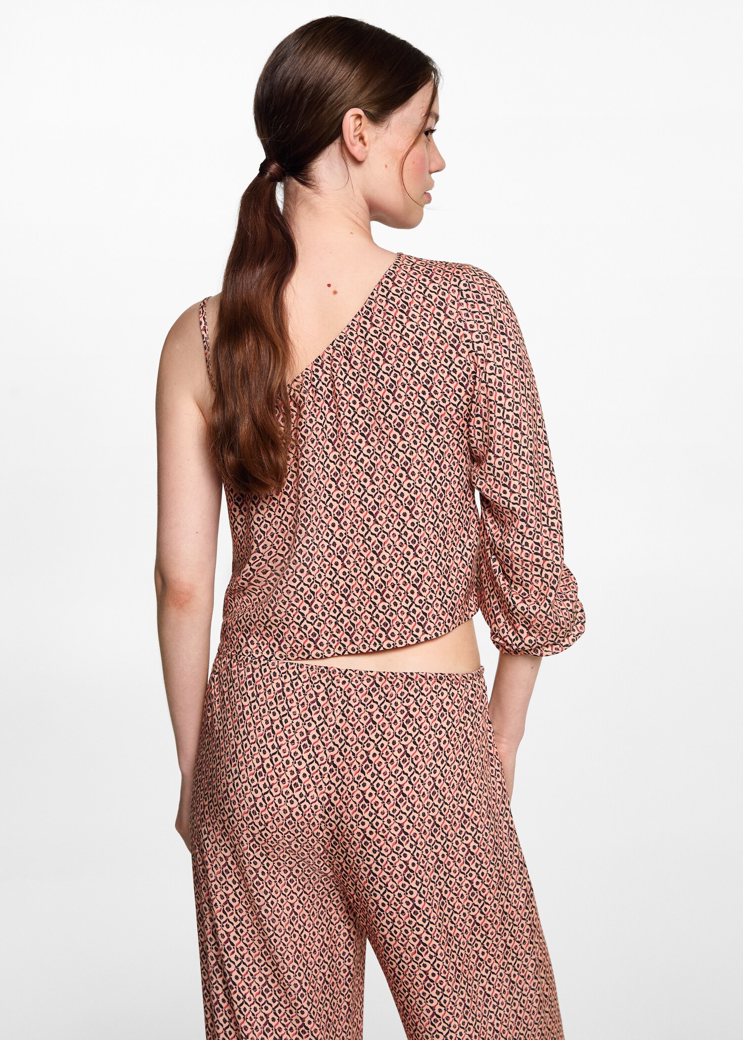 Blusa assimétrica estampada - Verso do artigo