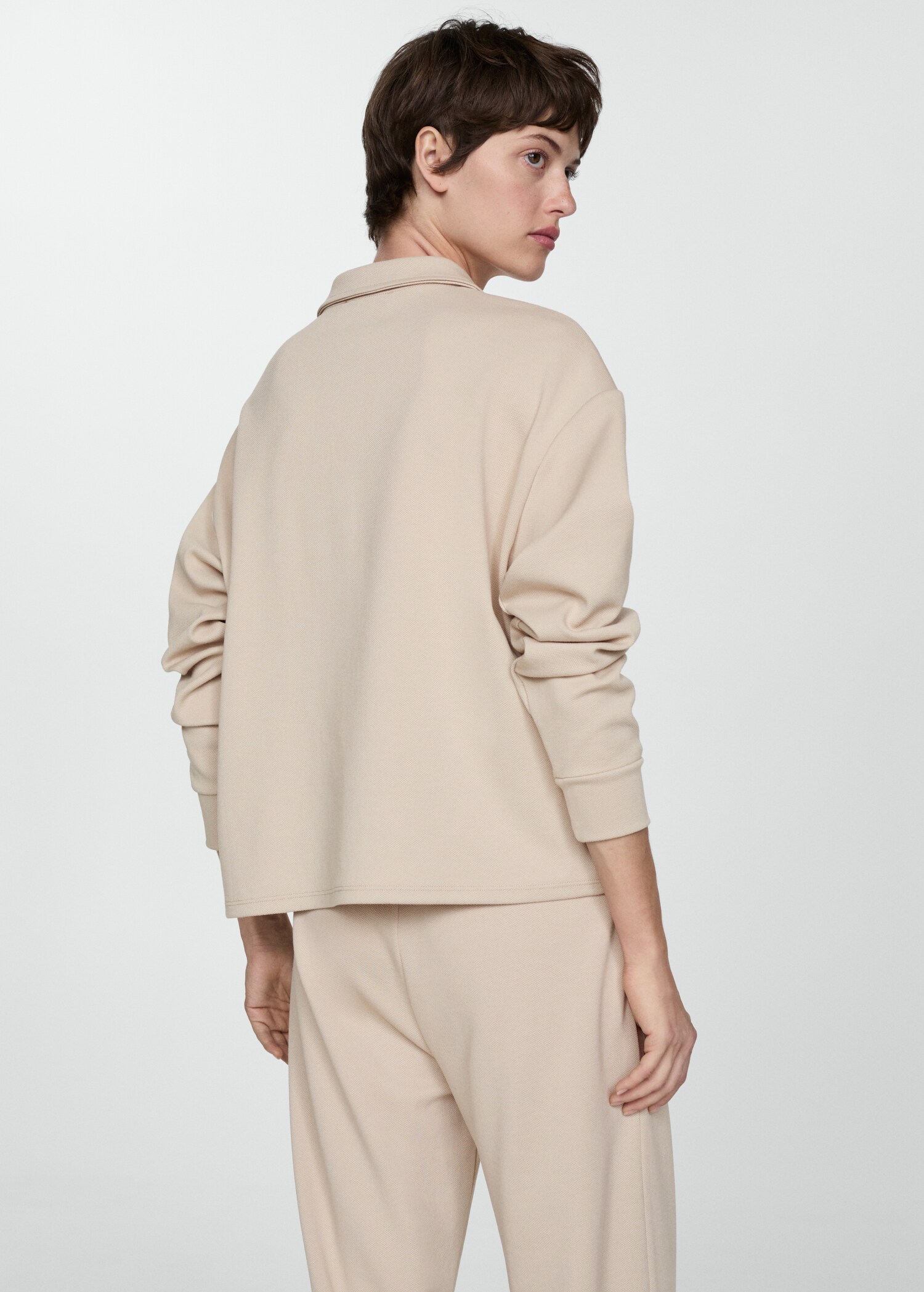 Sweatshirt tenniskrage - Artikelns baksida