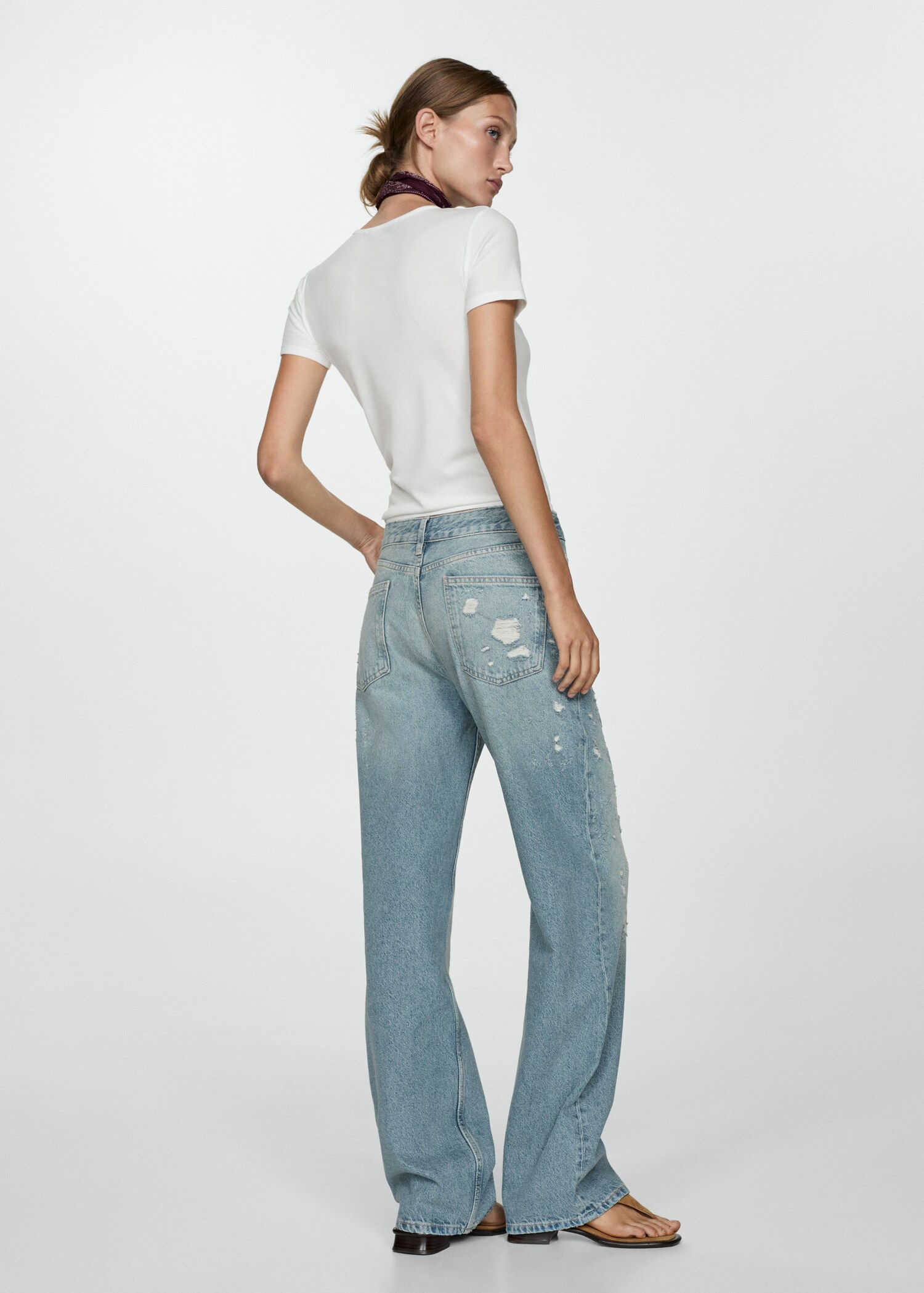 Ripped straight jeans - Reverse of the article