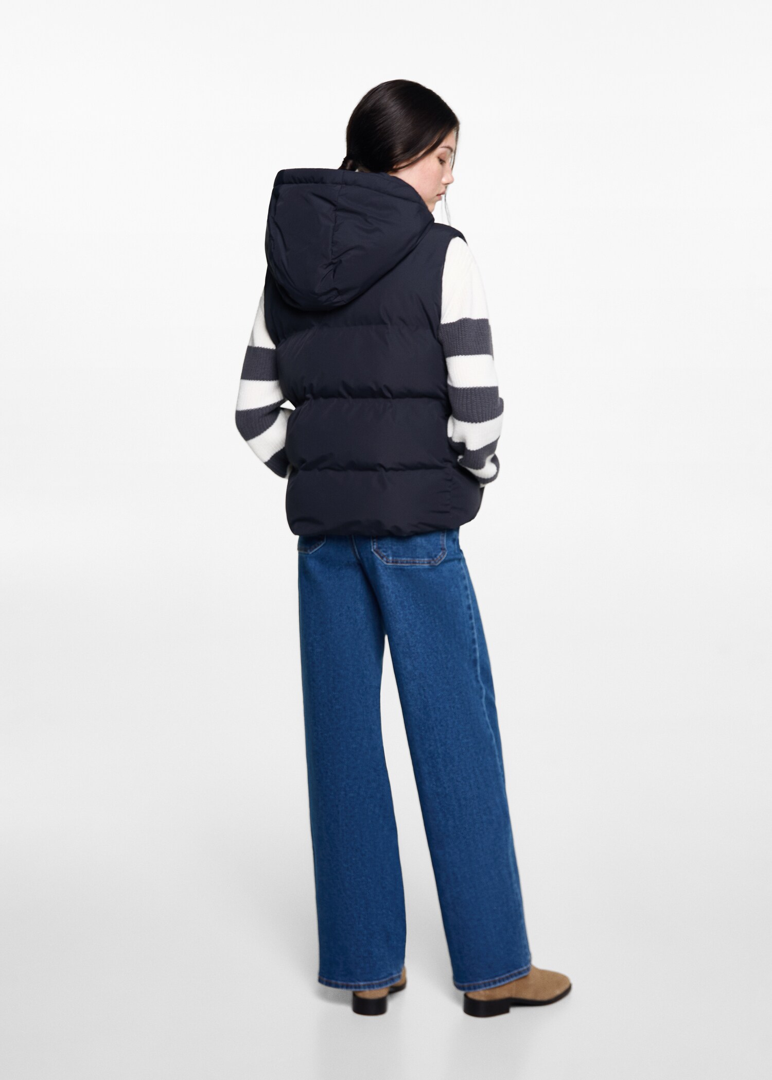 Quilted vest with hood - Reverse of the article