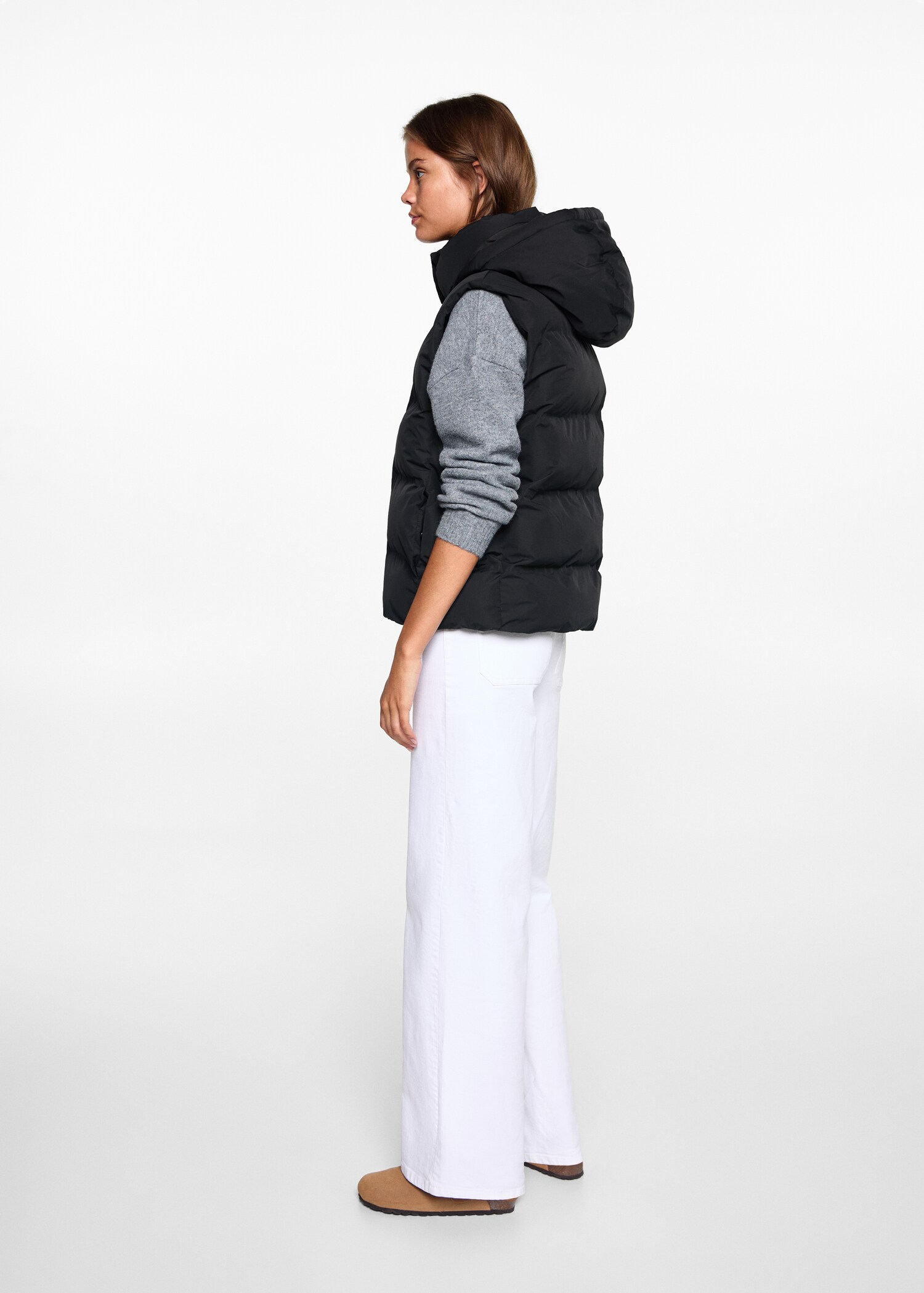 Quilted vest with hood - Reverse of the article