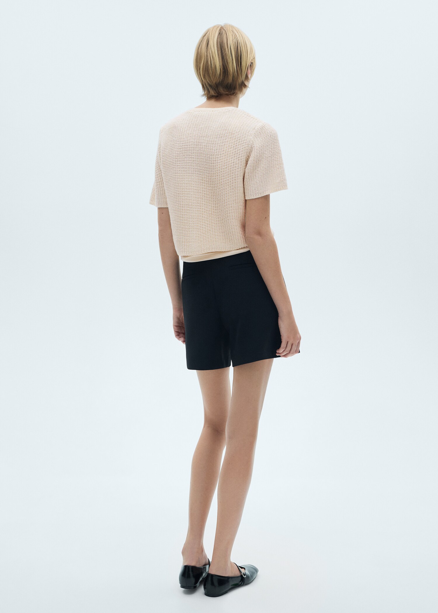 Short-sleeved knitted cardigan - Reverse of the article