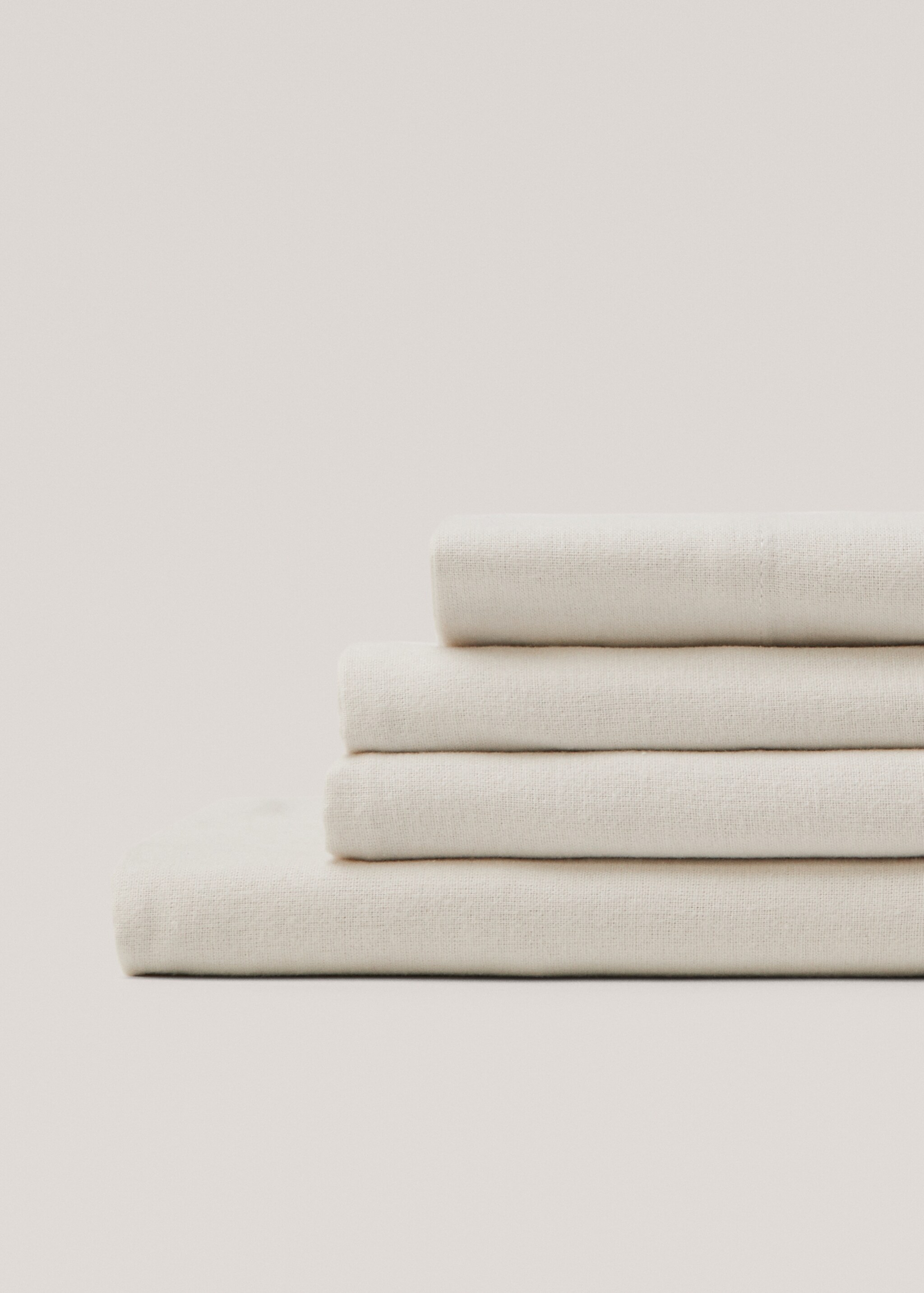 Plain flannel fitted sheet 135/140cm bed - Details of the article 2, Beige. Ref: 77037656-00.