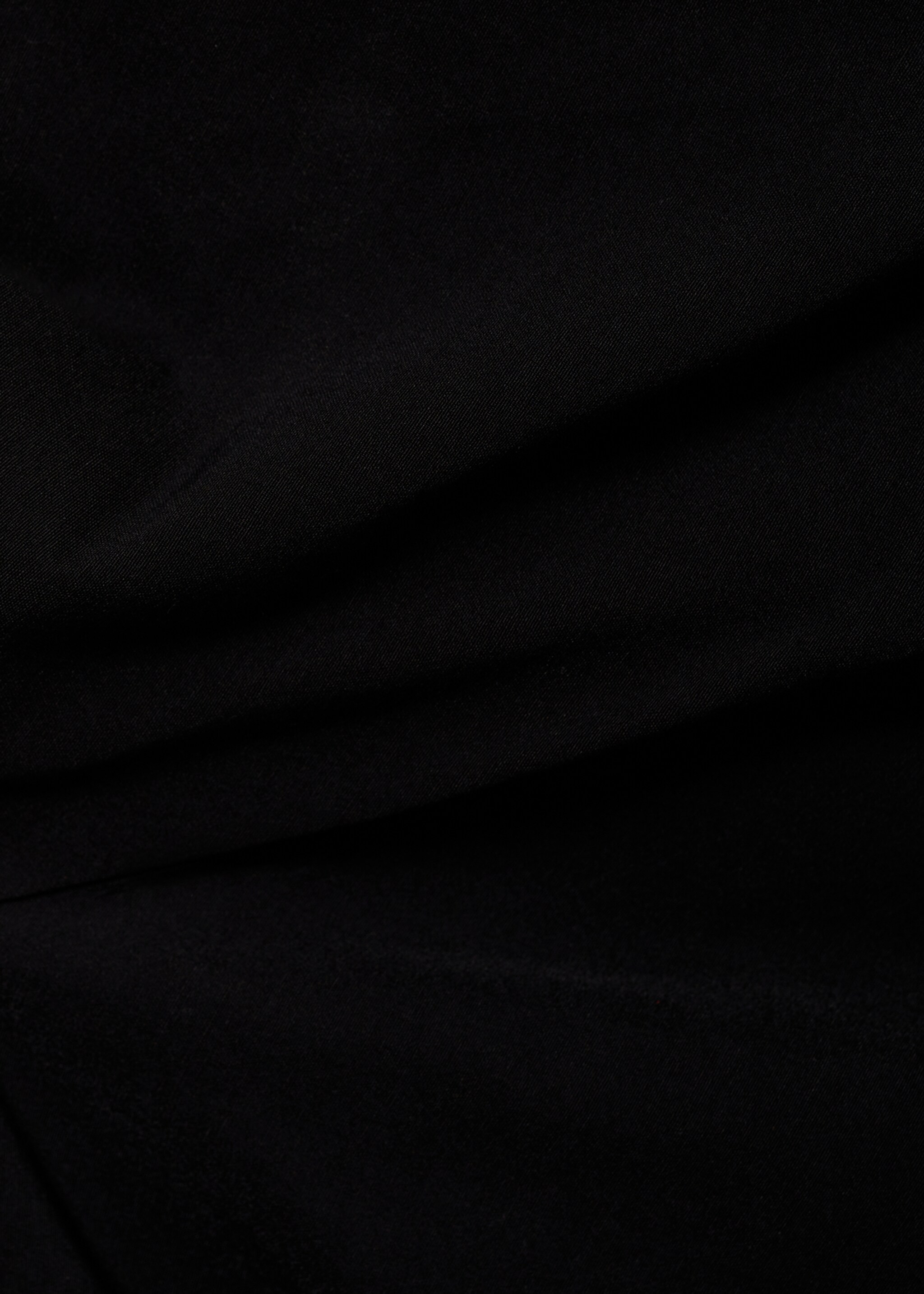 Asymmetrisches Top mit Drapierung - Detail des Artikels 8, Schwarz. Ref: 77038268-00.