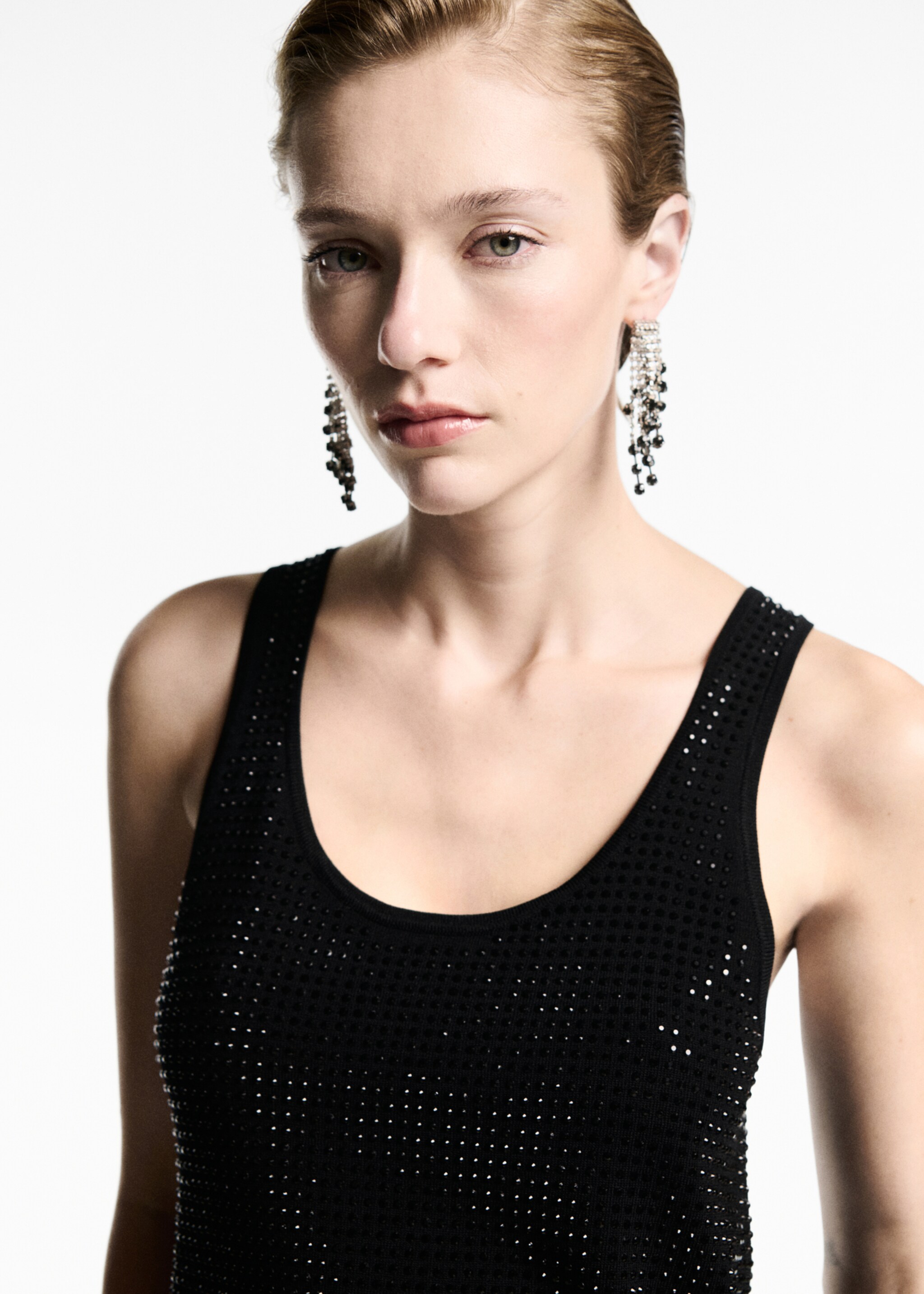 Gebreide top met strasdetail - Detail van het artikel 1, Zwart. Ref: 77039043-00.