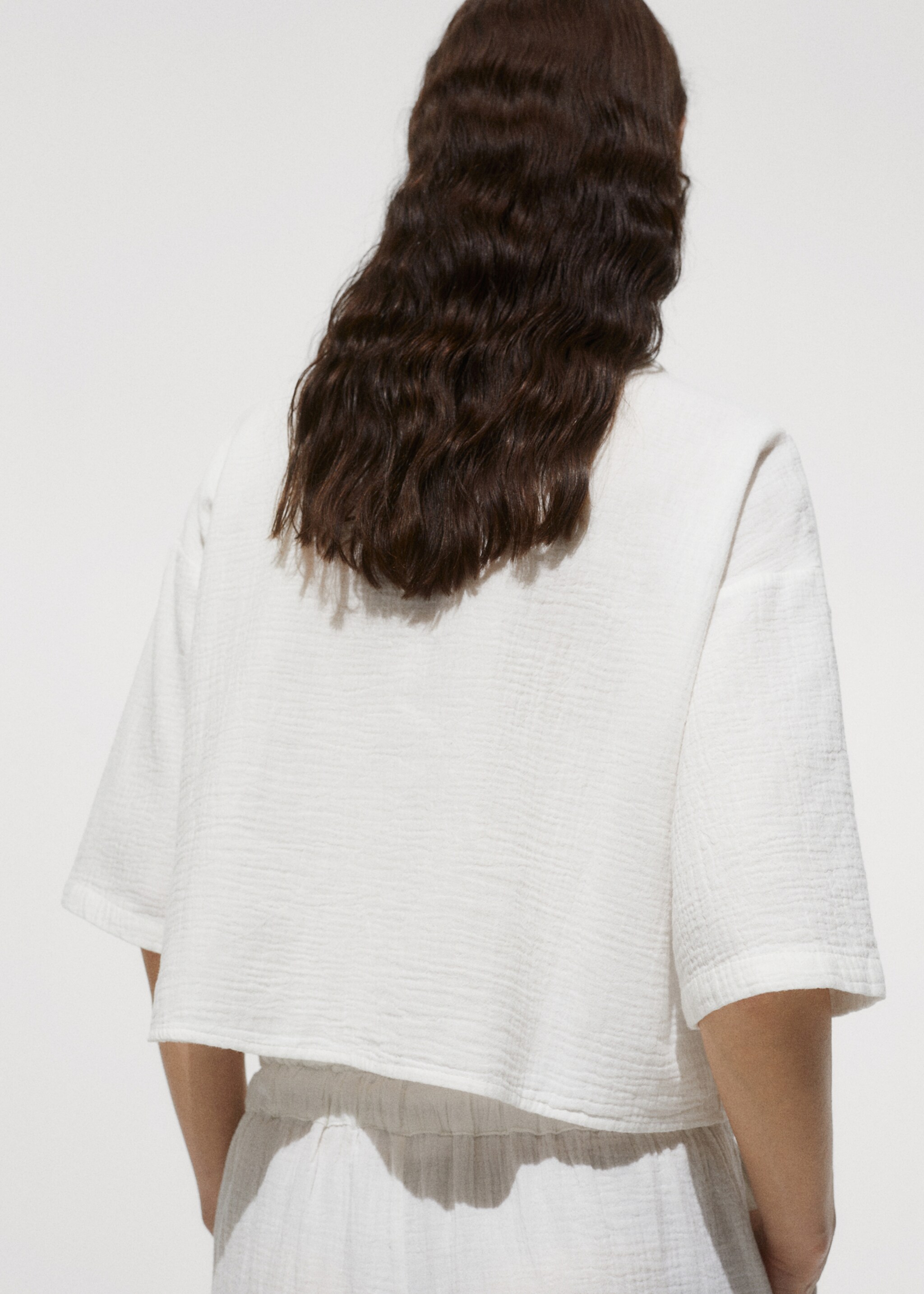 Short sleeved cotton shirt - Reverse of the article