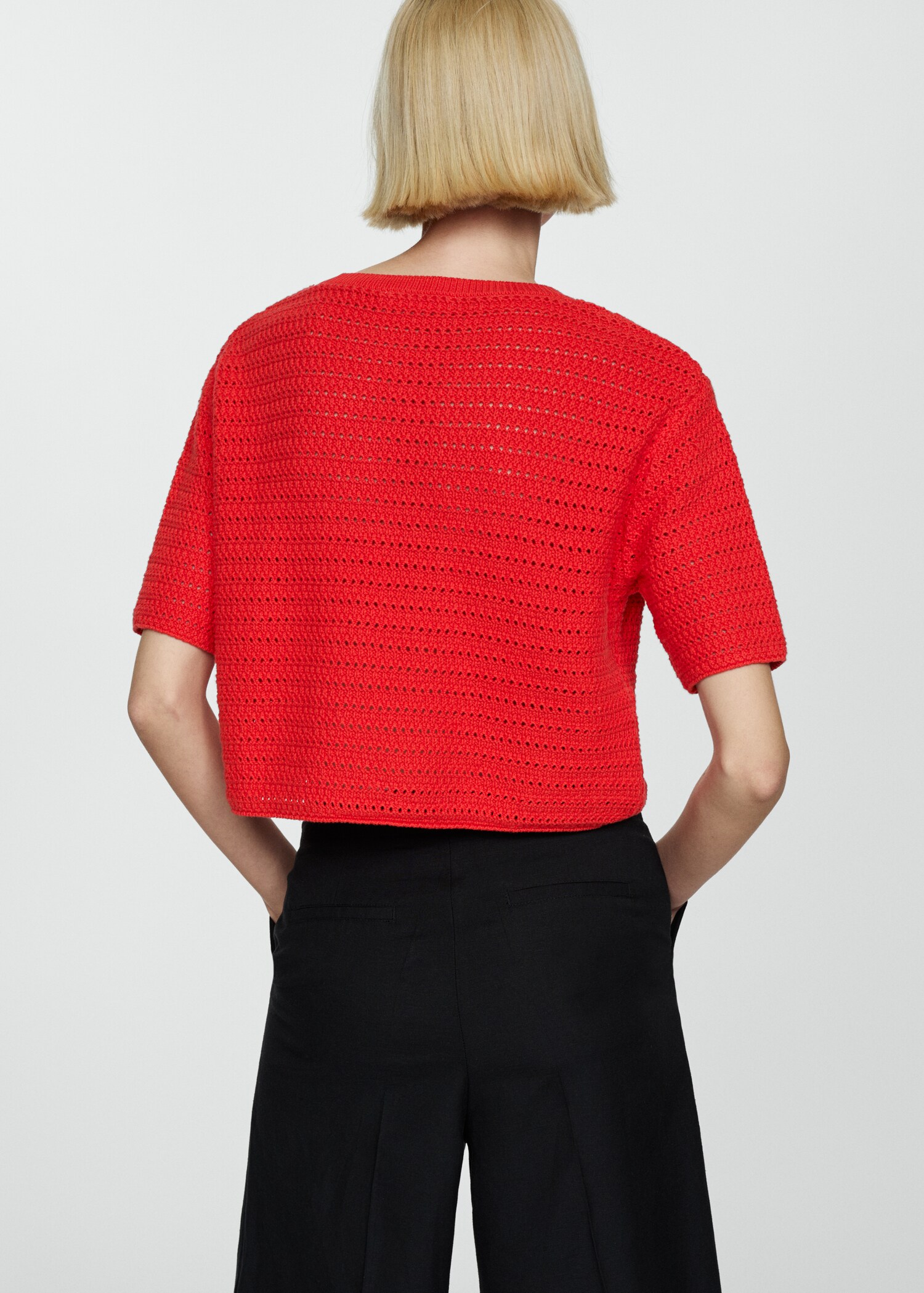 Knitted sweater with openwork details - Reverse of the article