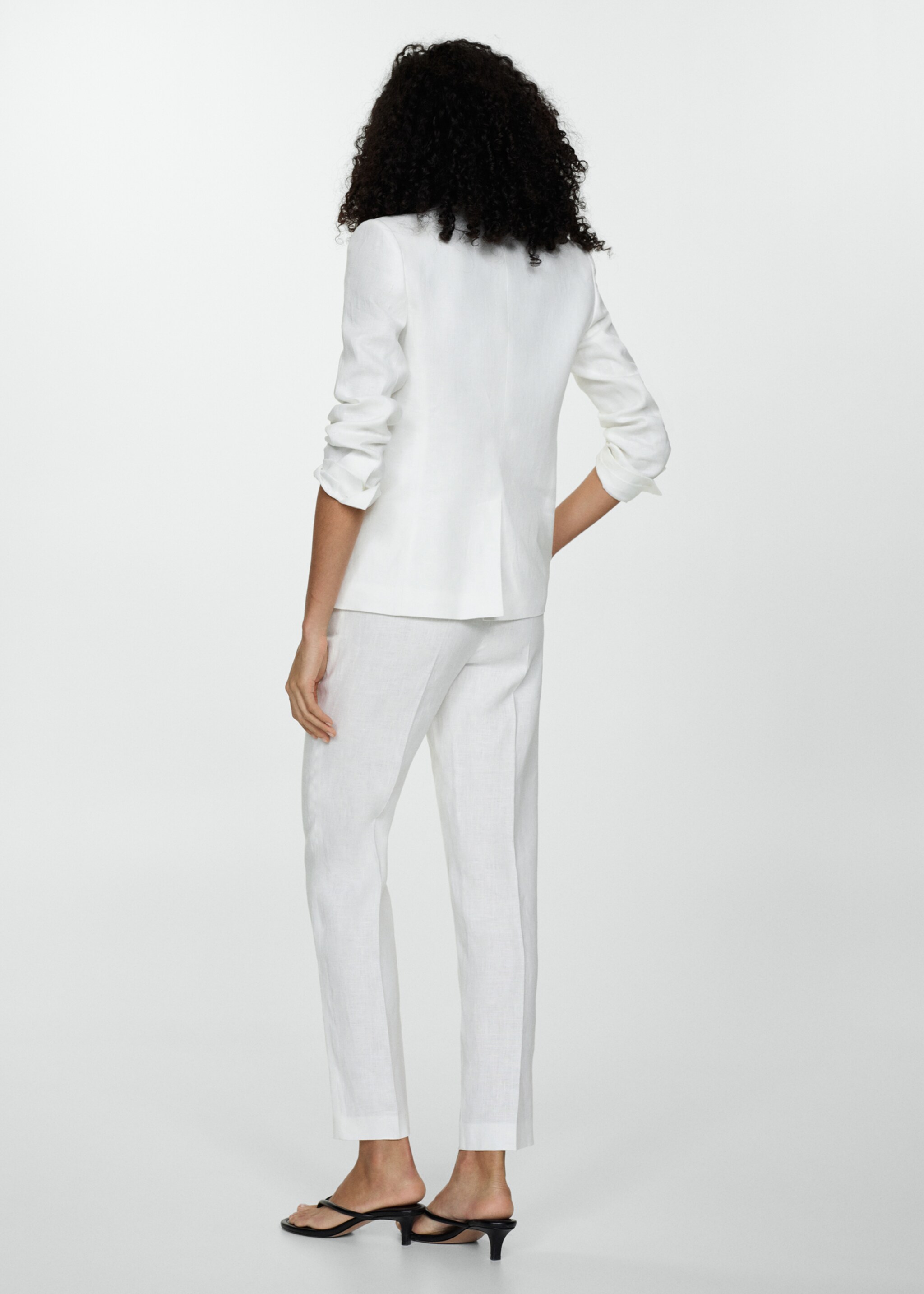 Pantalons vestit lli - Revers de l'article