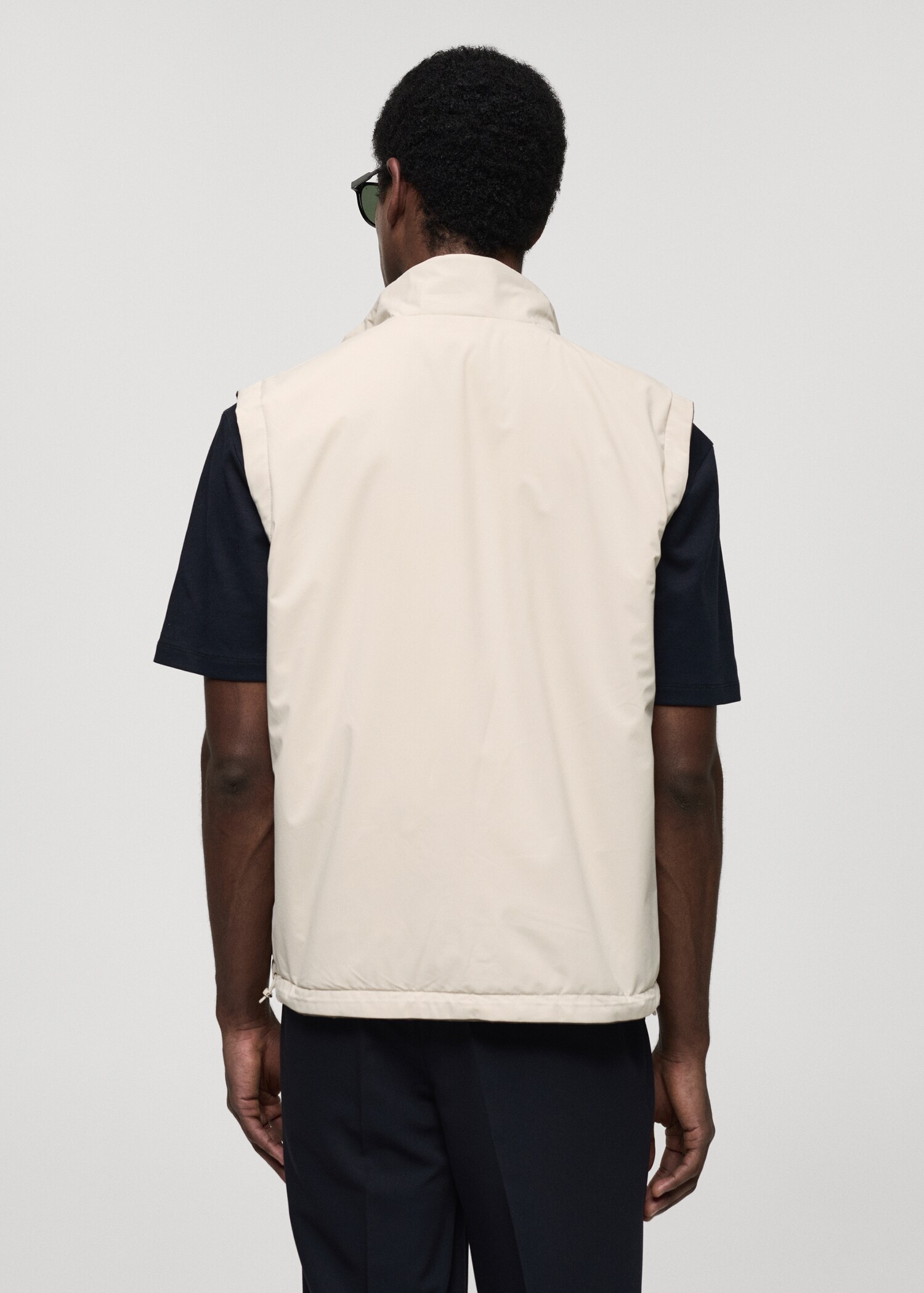 Waterafstotende reversibele bodywarmer - Achterkant van het artikel