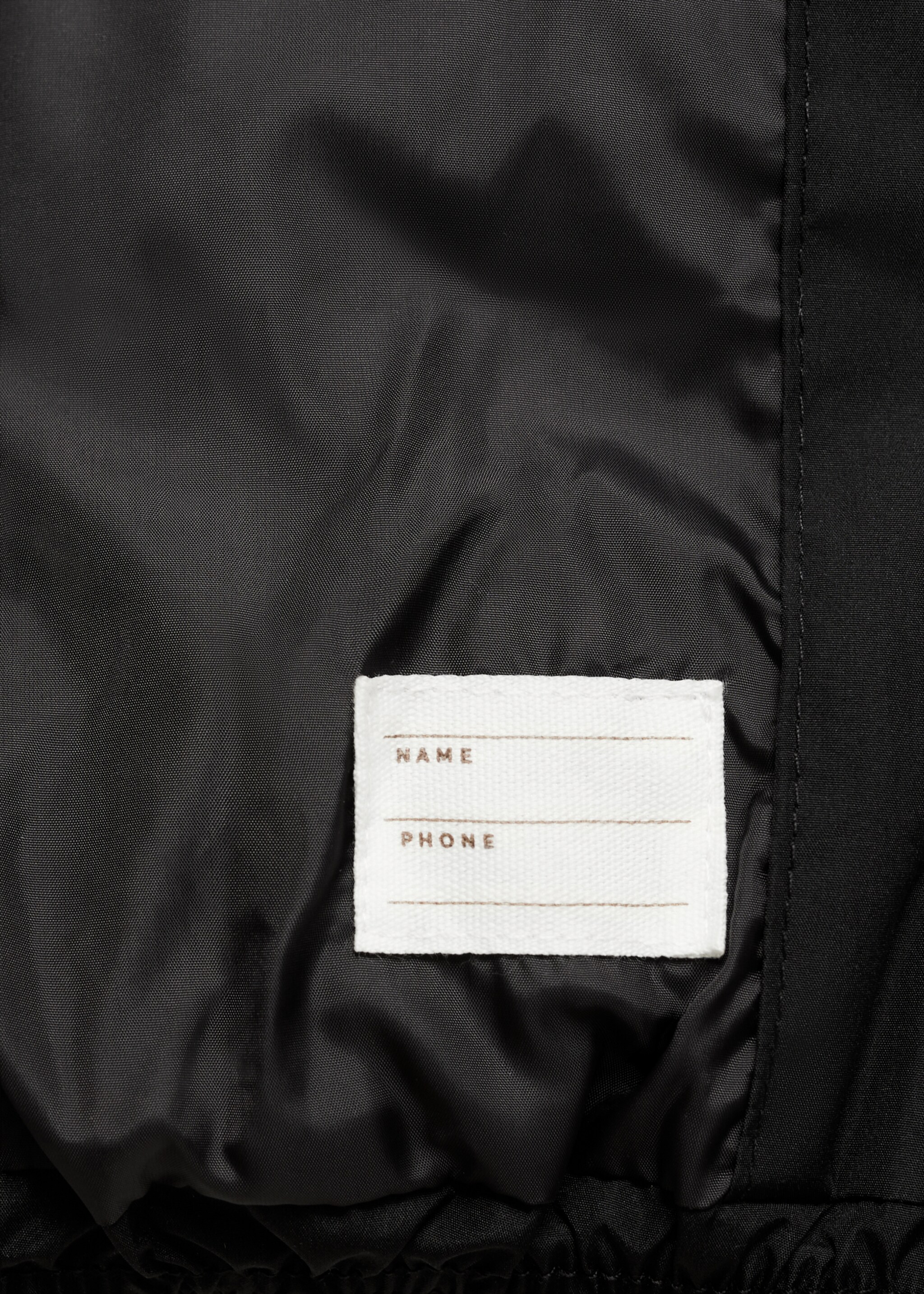 Anorak matelassé avec capuche - Détail de l'article 0, Noir. Ref: 77045147-00.