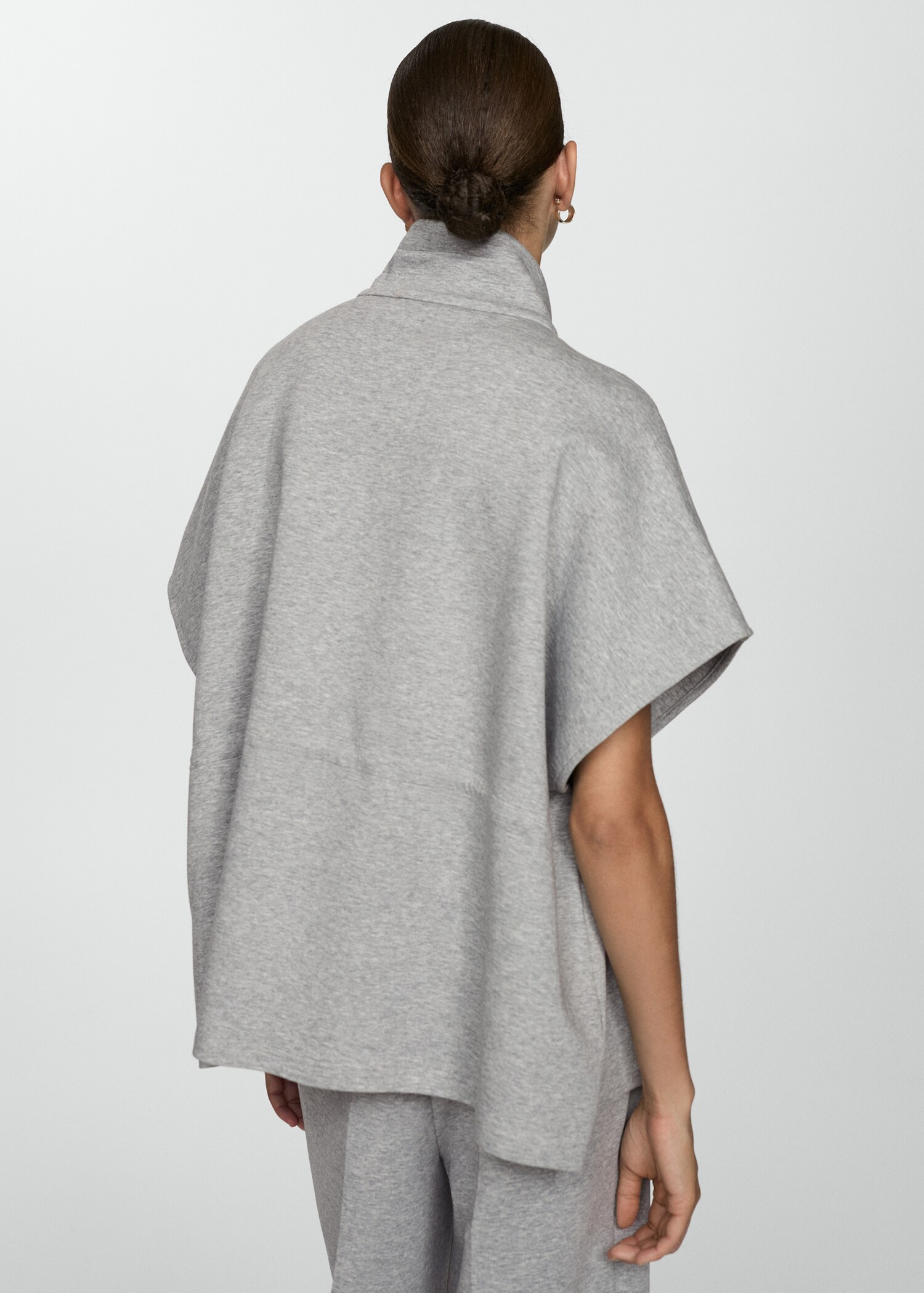Giacca poncho tasche falda - Retro dell'articolo