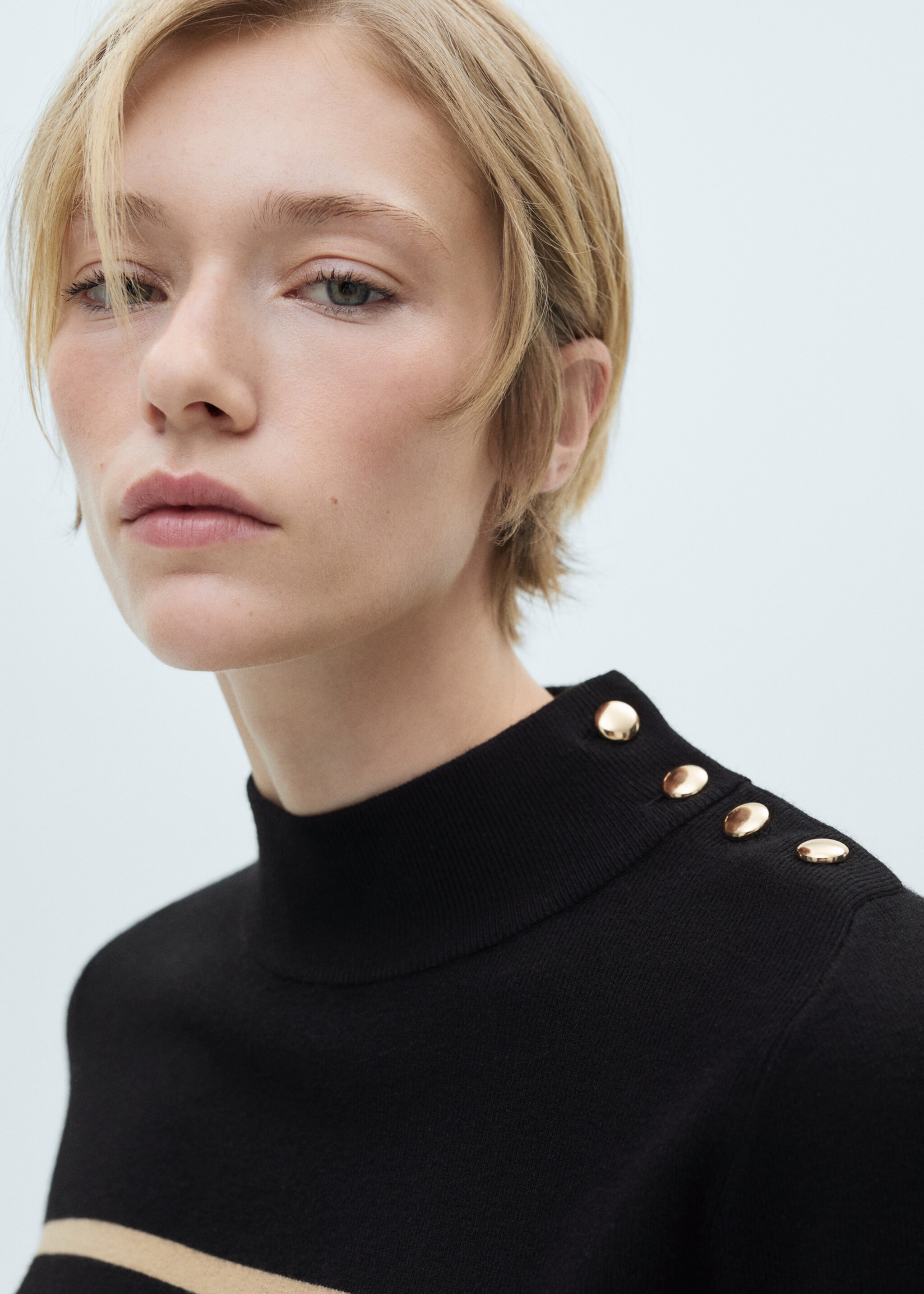 Sweater with shoulder buttons - Details of the article 1, Medium Brown. Ref: 77045641-00.