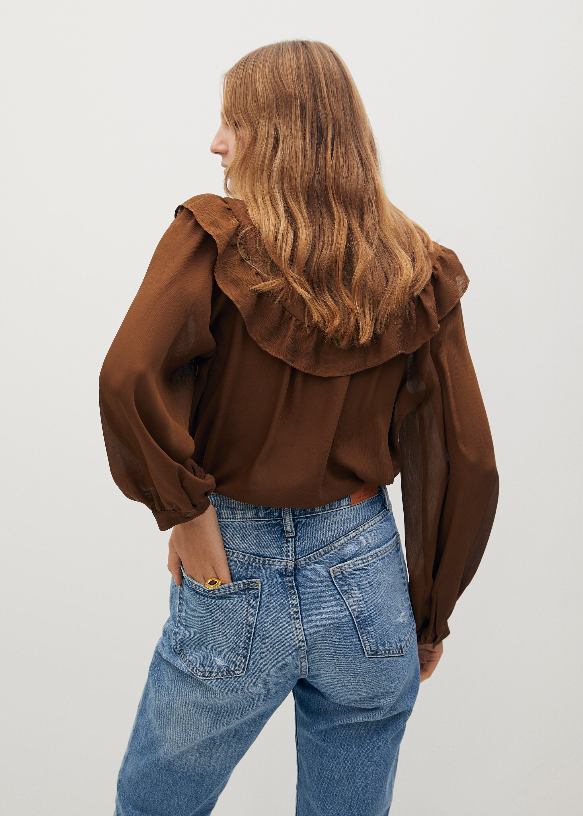 Blusa volantes - Reverso del artículo