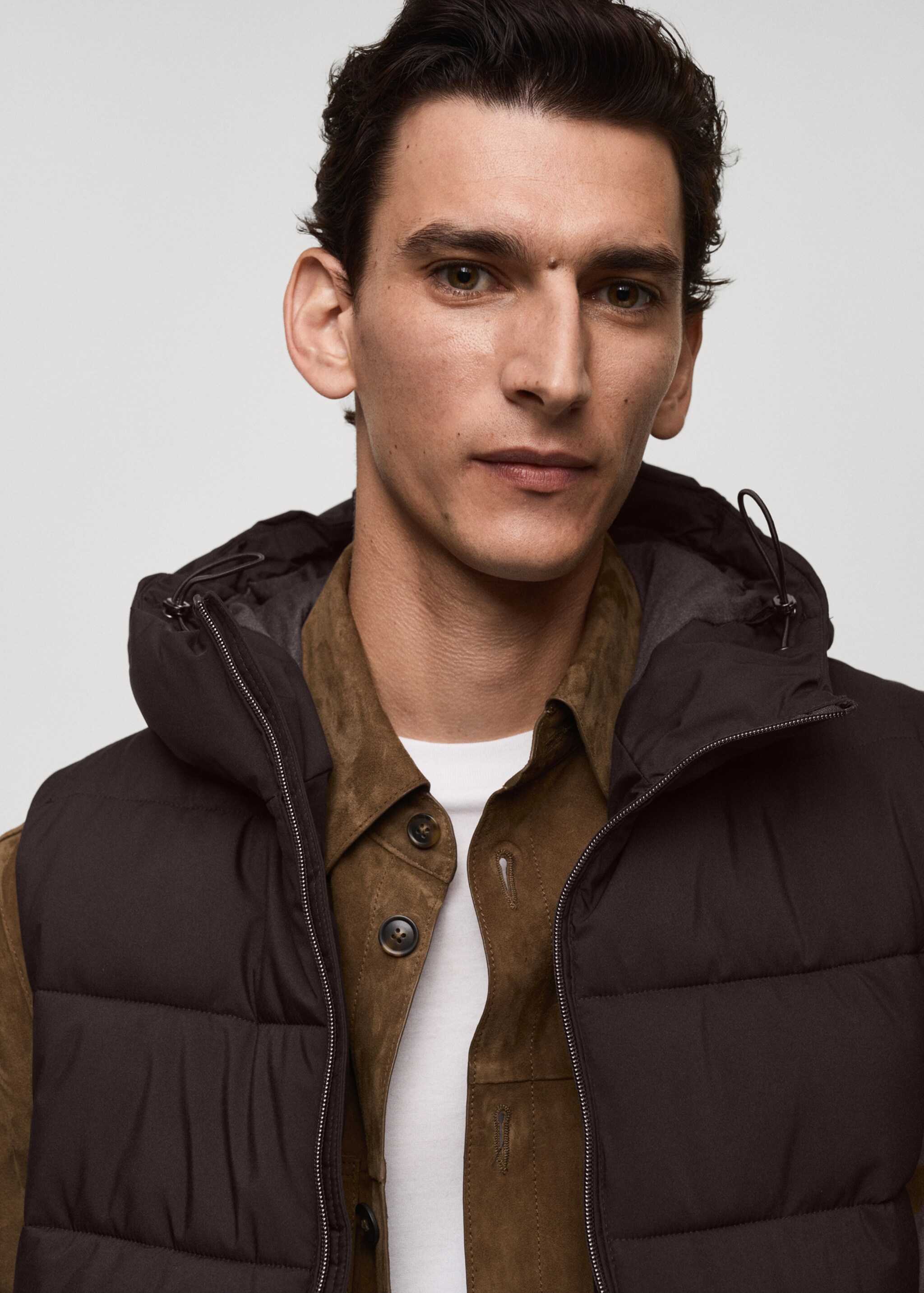 Water-repellent quilted gilet - Details of the article 1, Brown. Ref: 77047911-00.