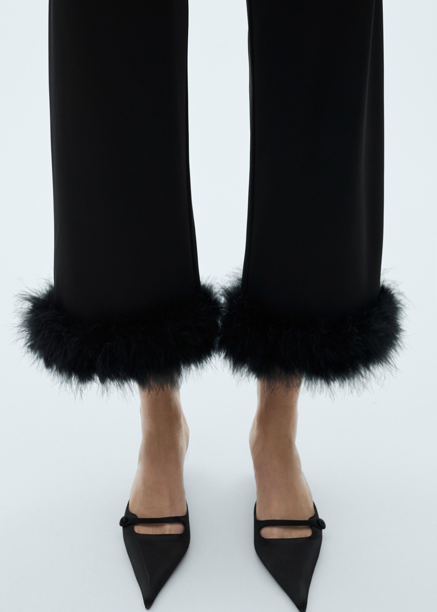 Cropped trousers with feather detail - Details of the article 1