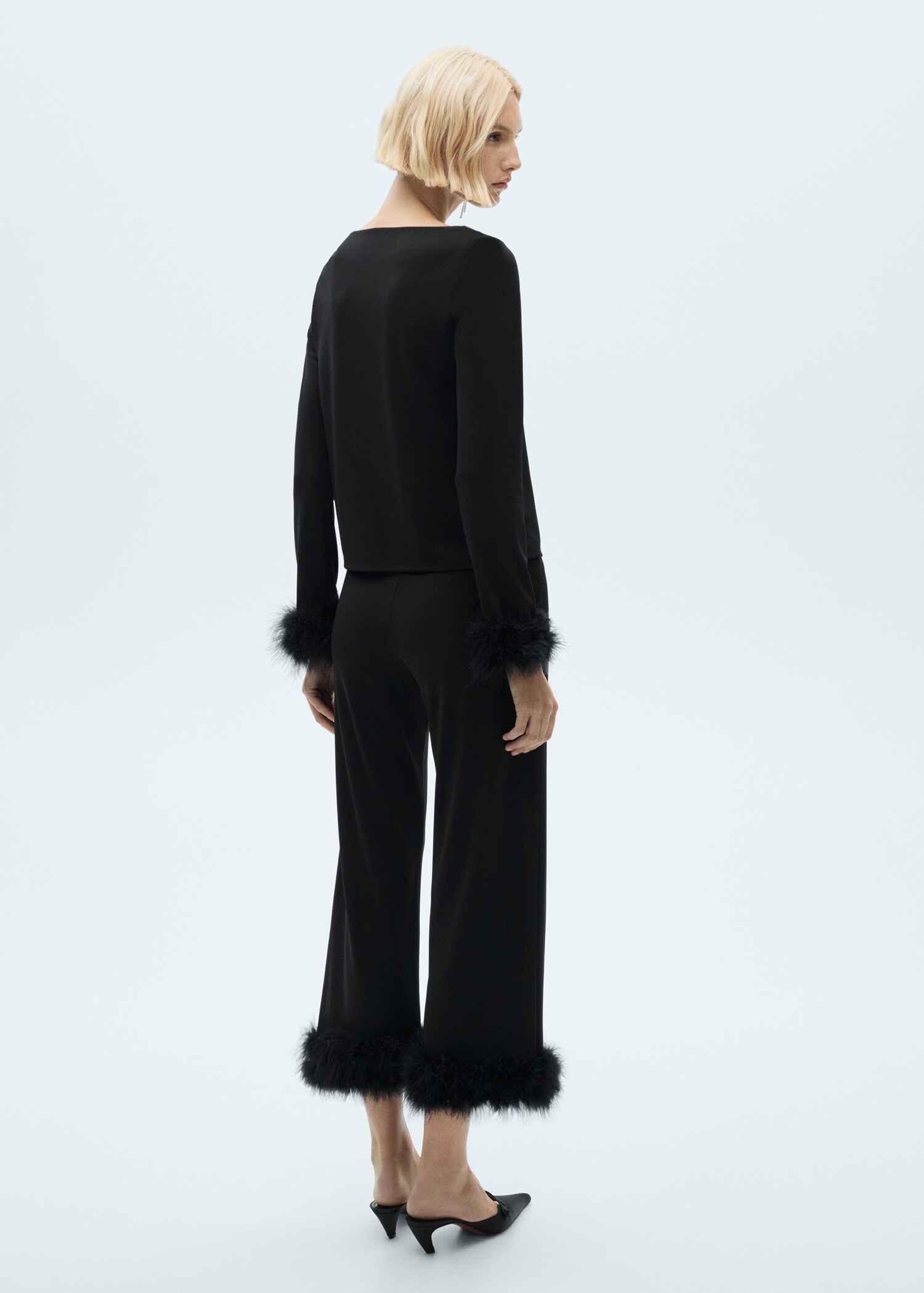Cropped trousers with feather detail - Reverse of the article