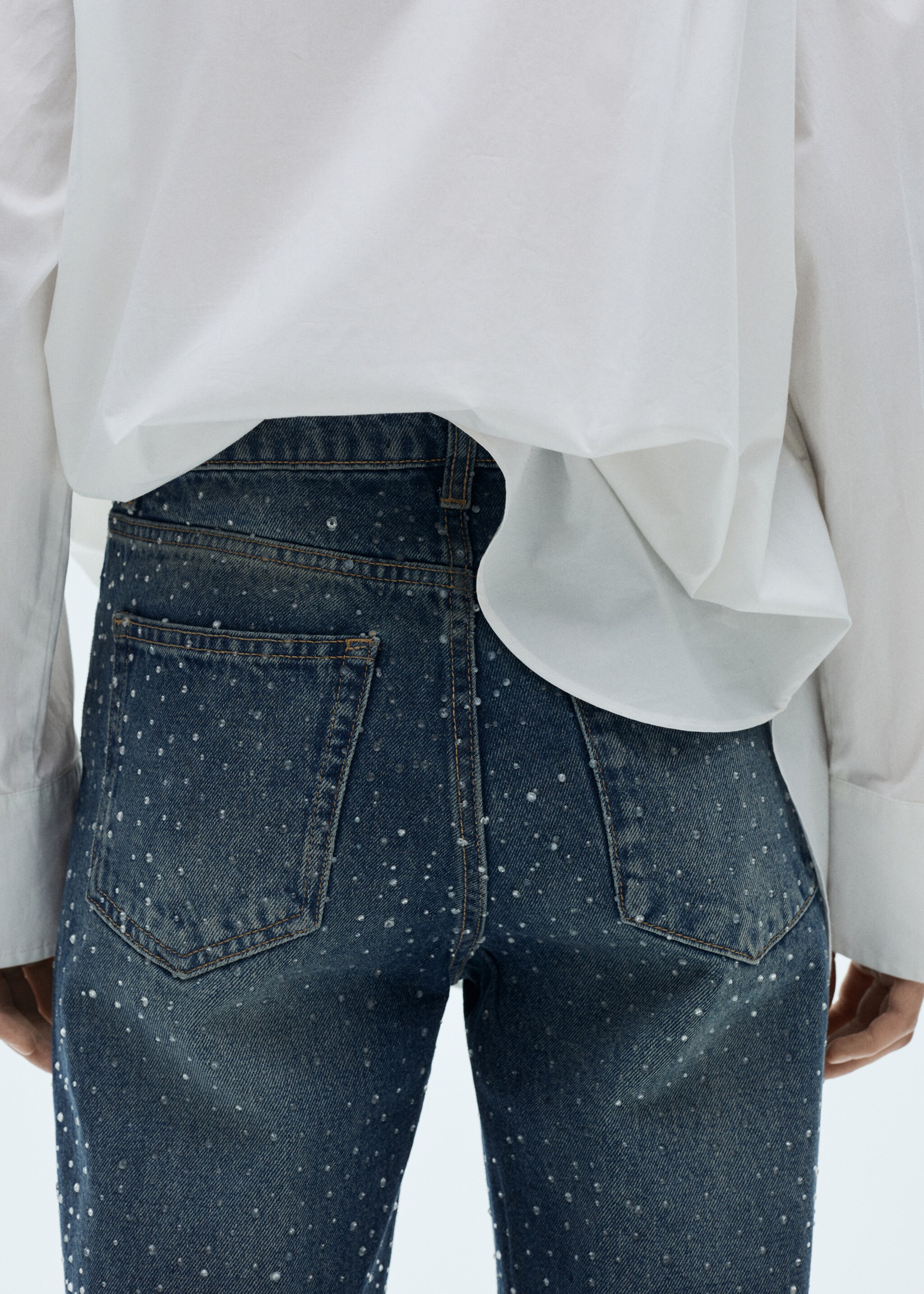 Straight-fit jeans with rhinestone detail - Details of the article 1, Dark Blue. Ref: 77049067-00.