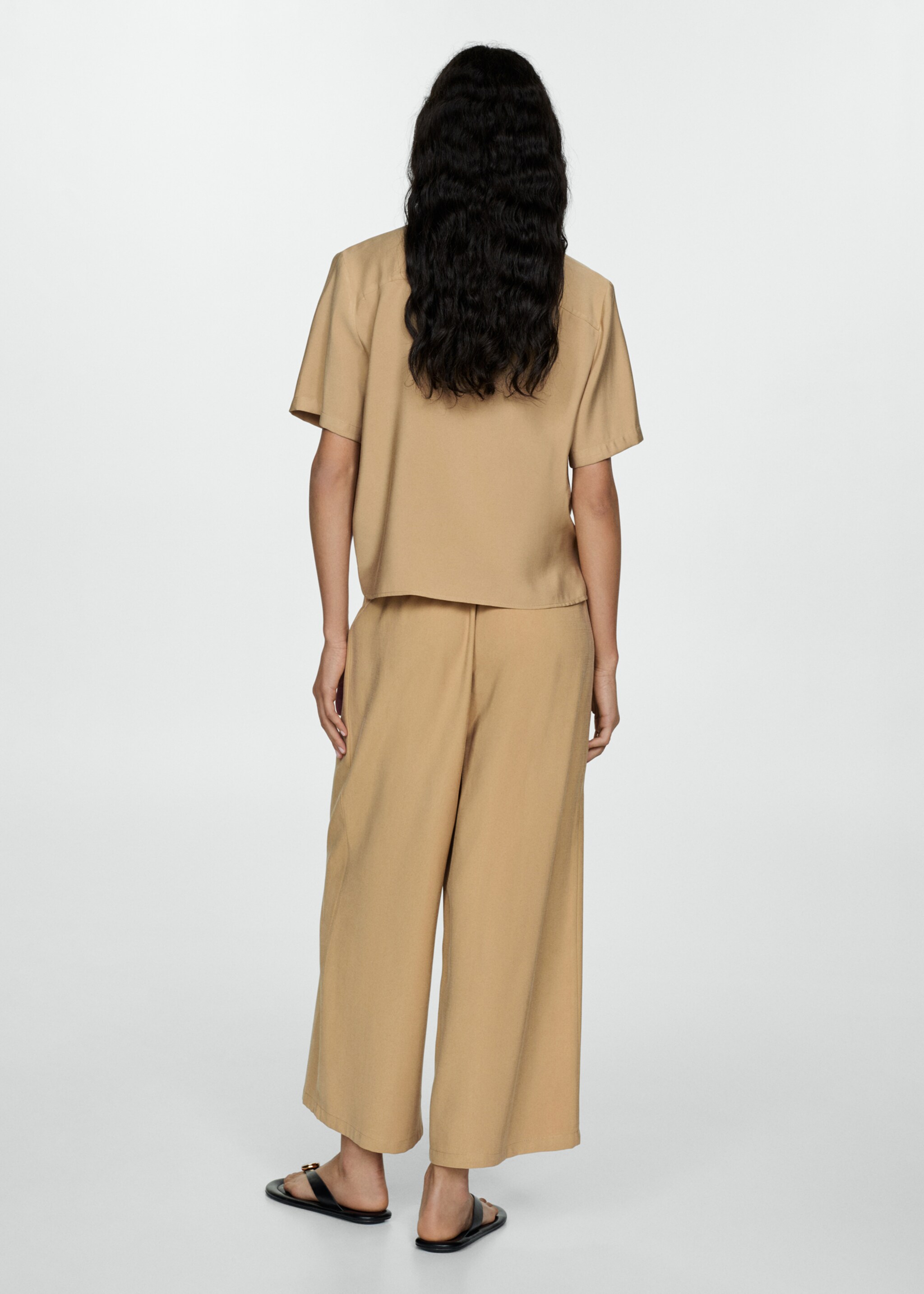 Wideleg trousers with elastic waist - Reverse of the article