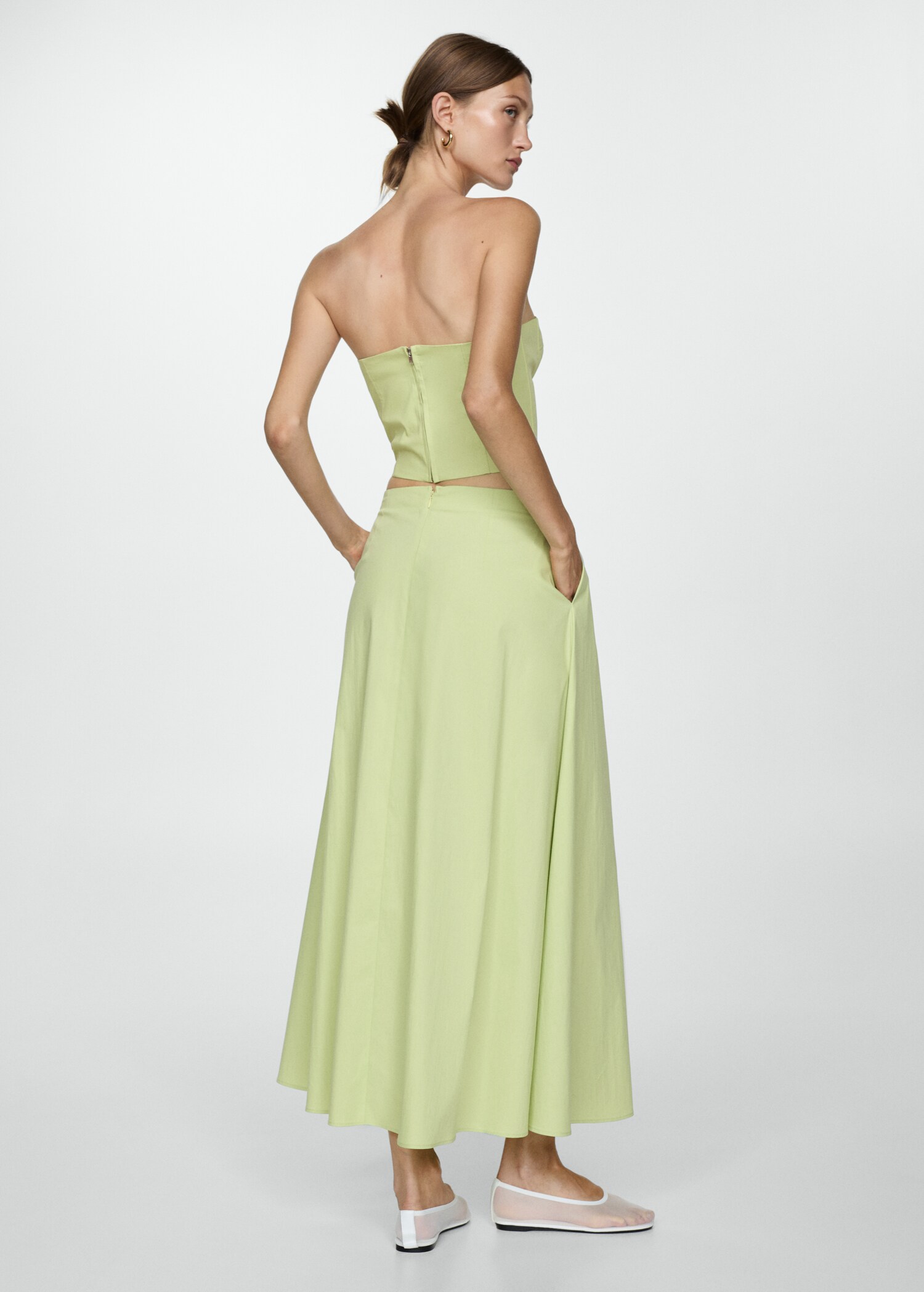 Long flared skirt - Reverse of the article