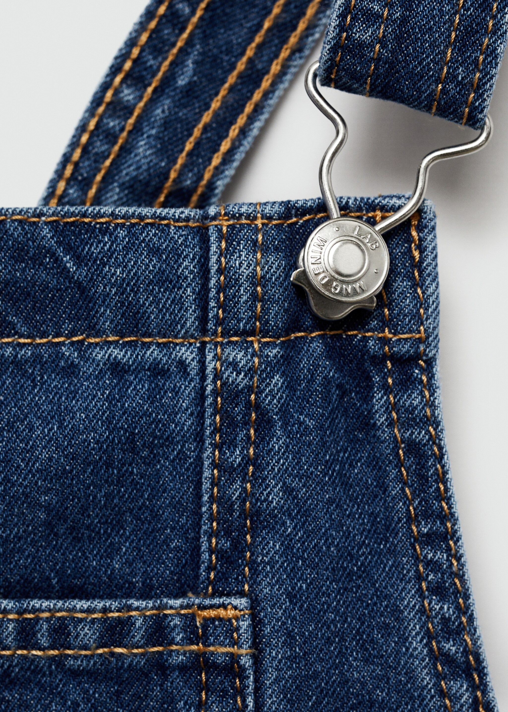 Short denim pinafore - Details of the article 8, Medium Blue. Ref: 77051008-00.