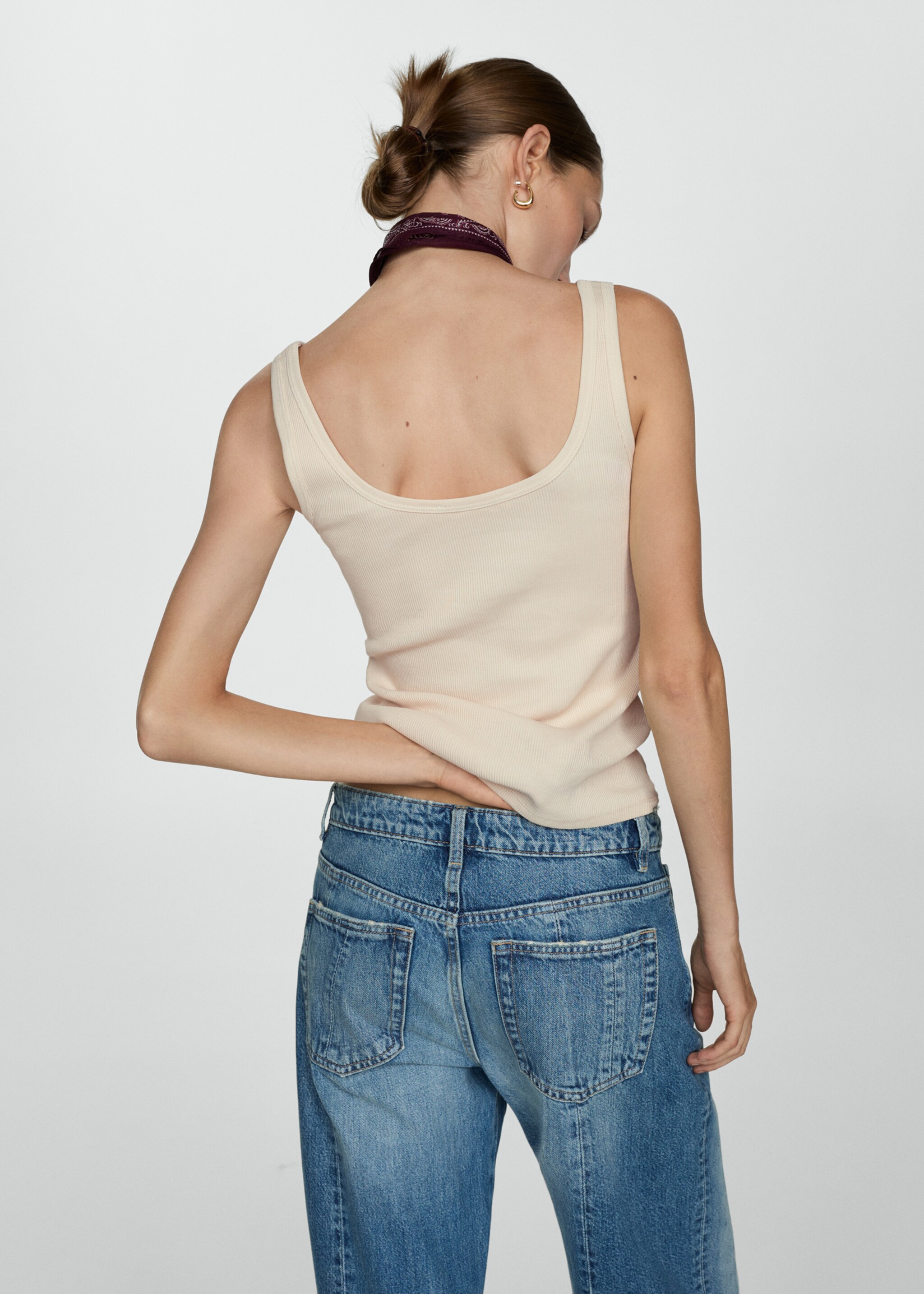 Top with straps and buttons - Reverse of the article
