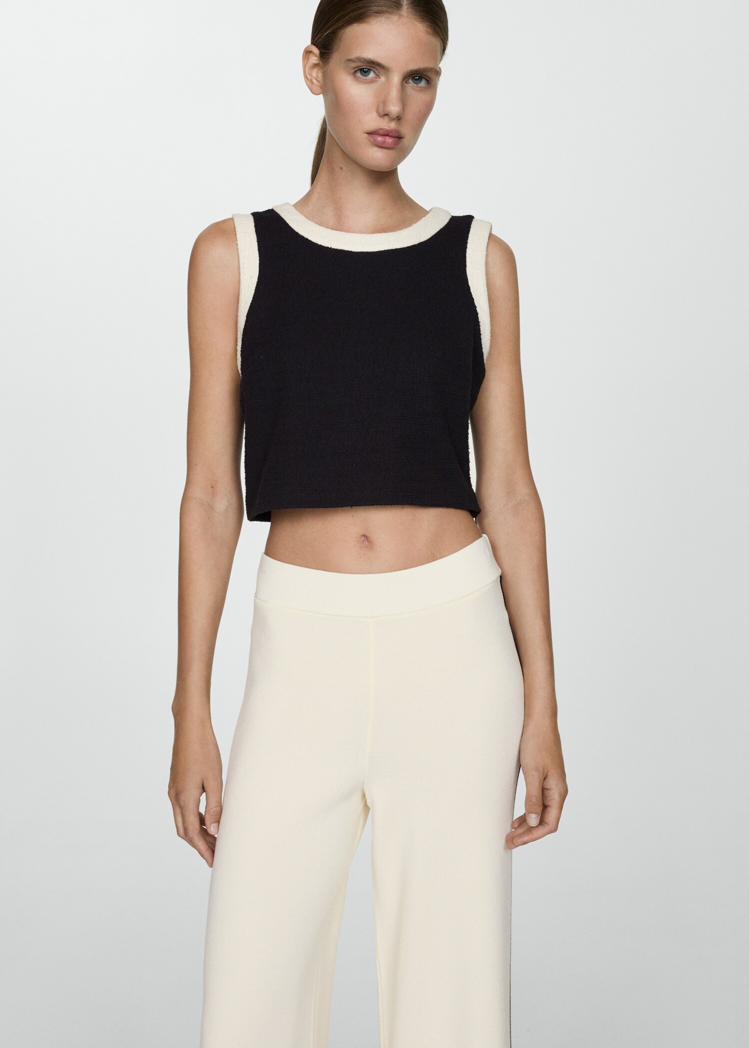 Striped knitted trousers with contrasting sides - Details of the article 1