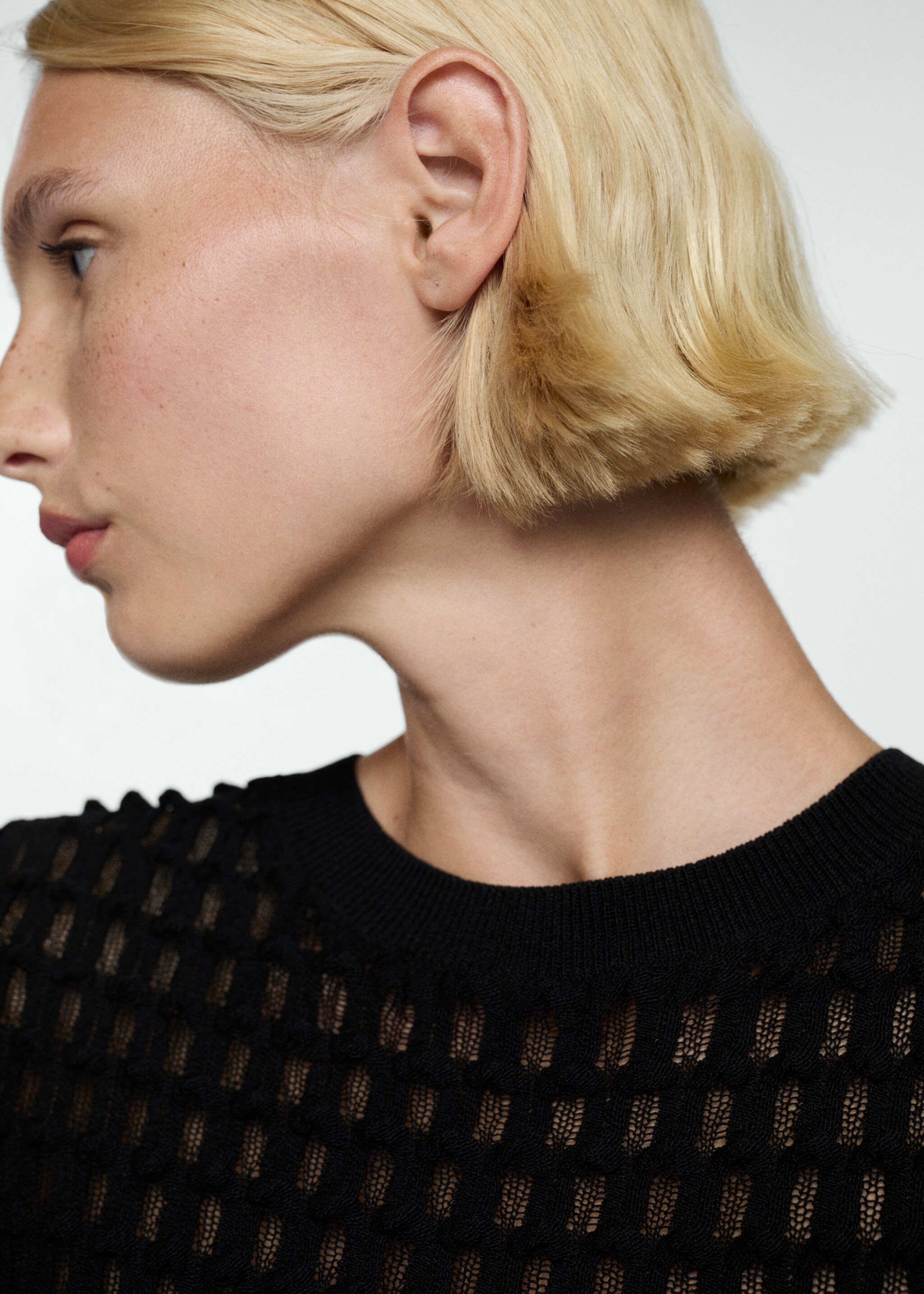 Short sleeve textured sweater - Details of the article 1, Black. Ref: 77054061-00.
