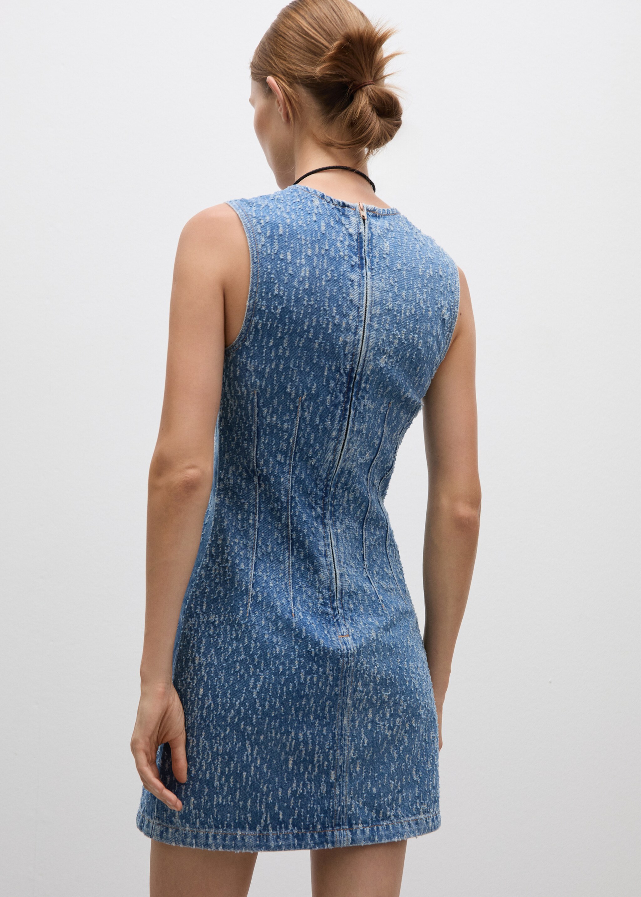 Ripped short denim dress - Reverse of the article