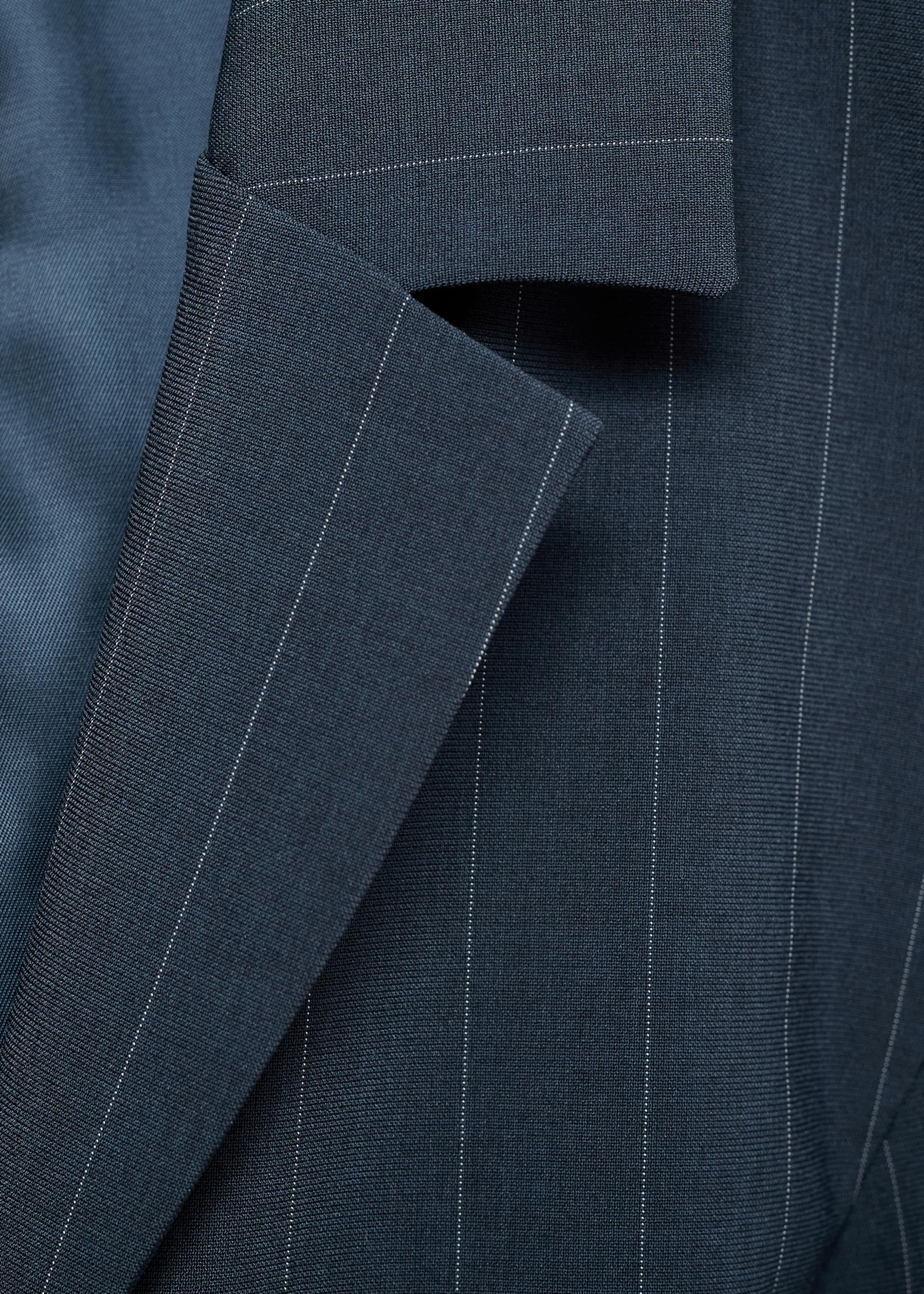 Long pinstripe jumpsuit - Details of the article 8, Dark Navy. Ref: 77055659-00.