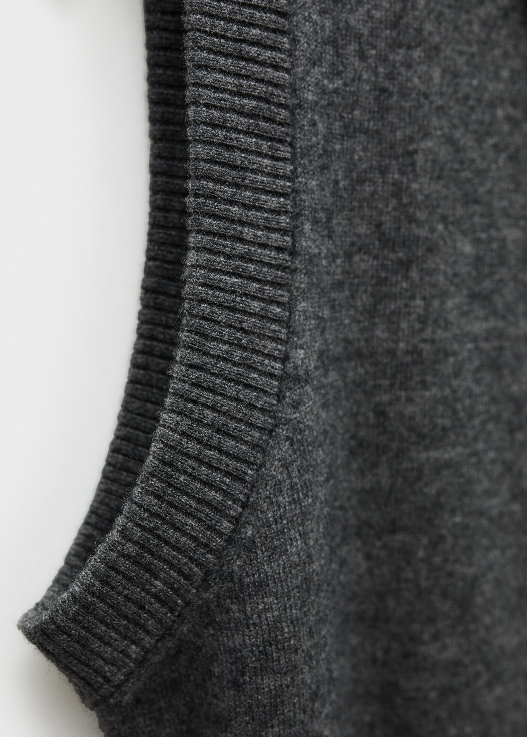 Wool-blend gilet with buttons - Details of the article 8, Dark Heather Grey. Ref: 77056747-00.