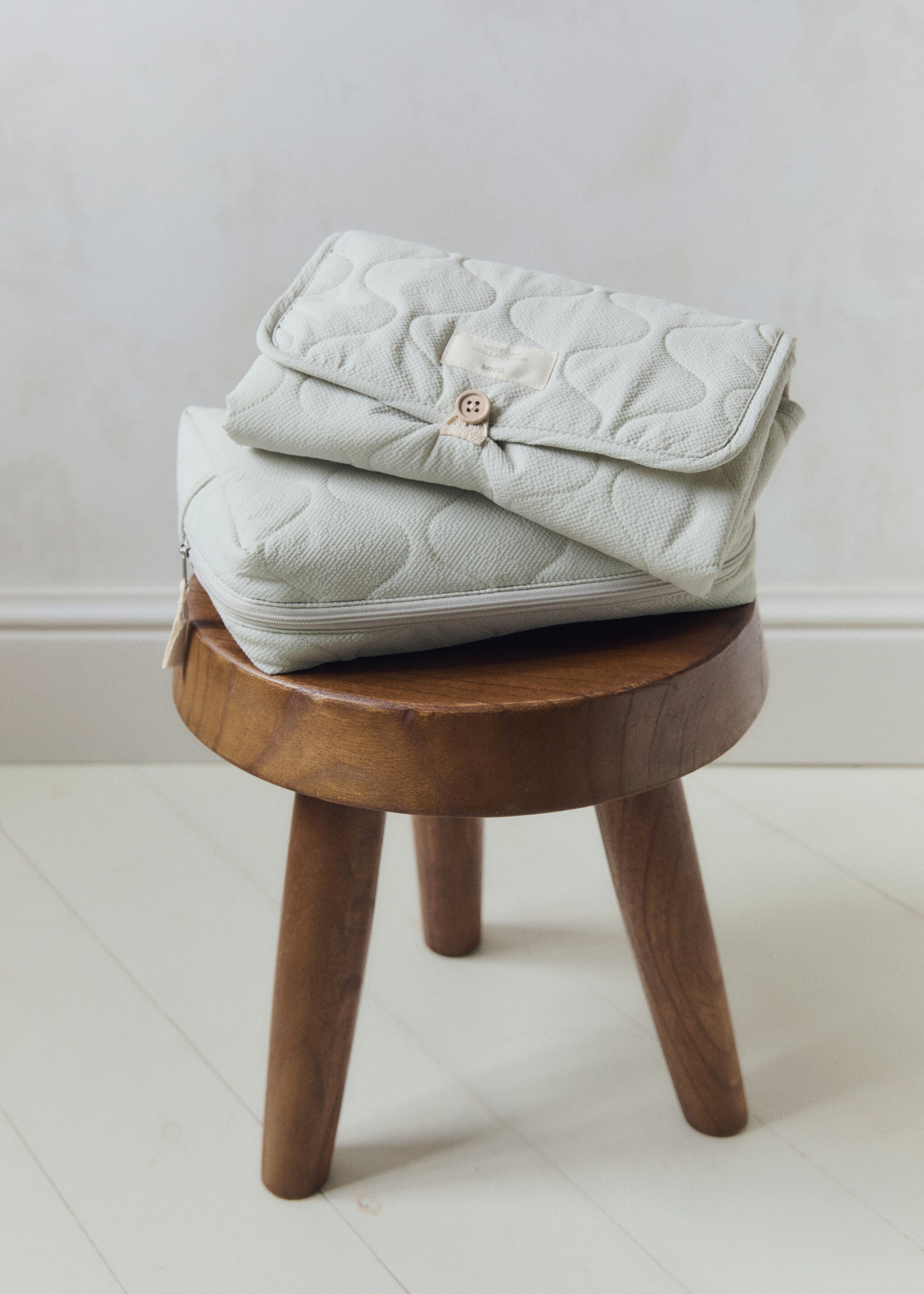 Gewatteerd aankleedkussen - Detail van het artikel 6, Pastelgroen. Ref: 77056749-00.