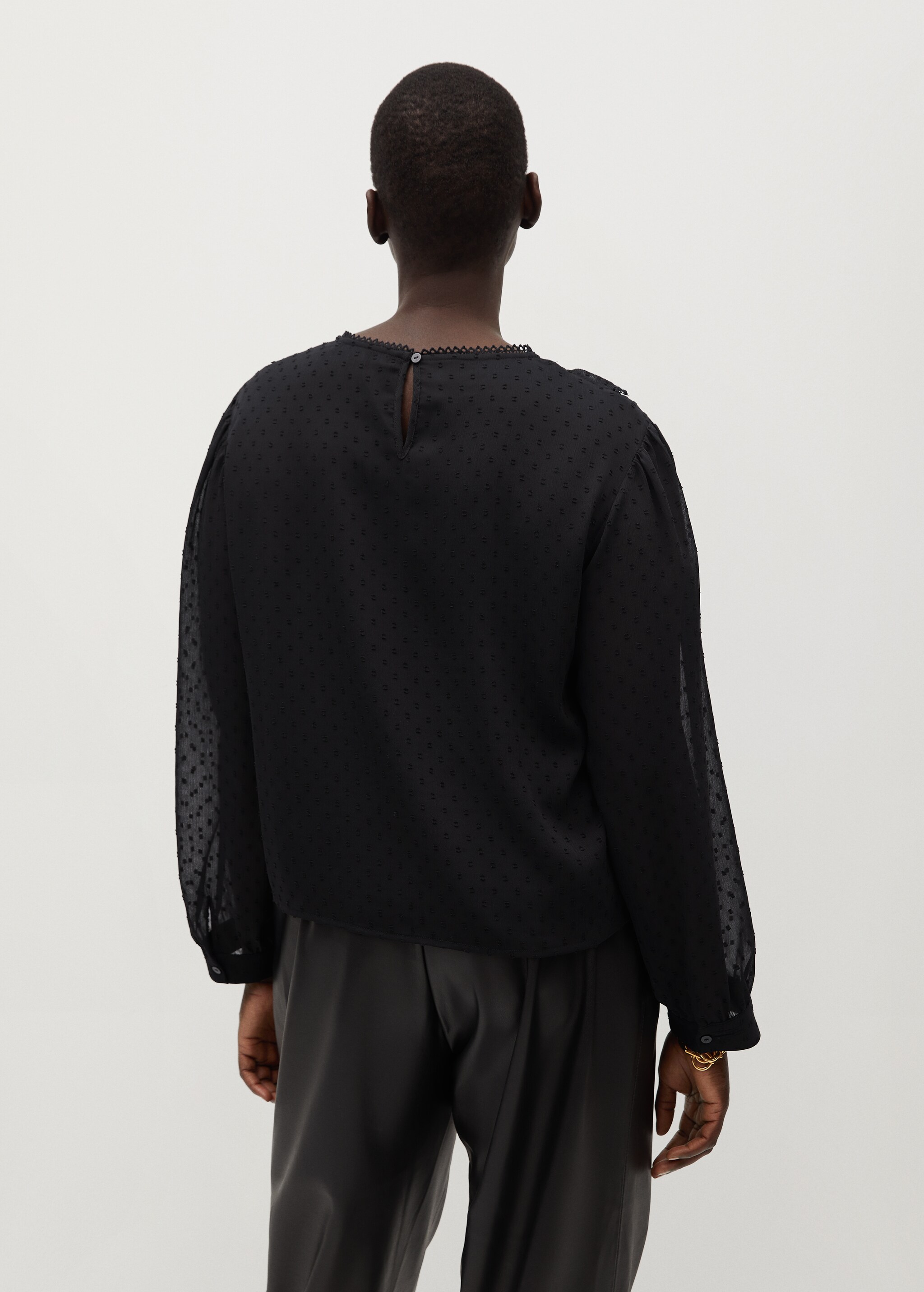 Blusa plumeti volantes - Reverso del artículo