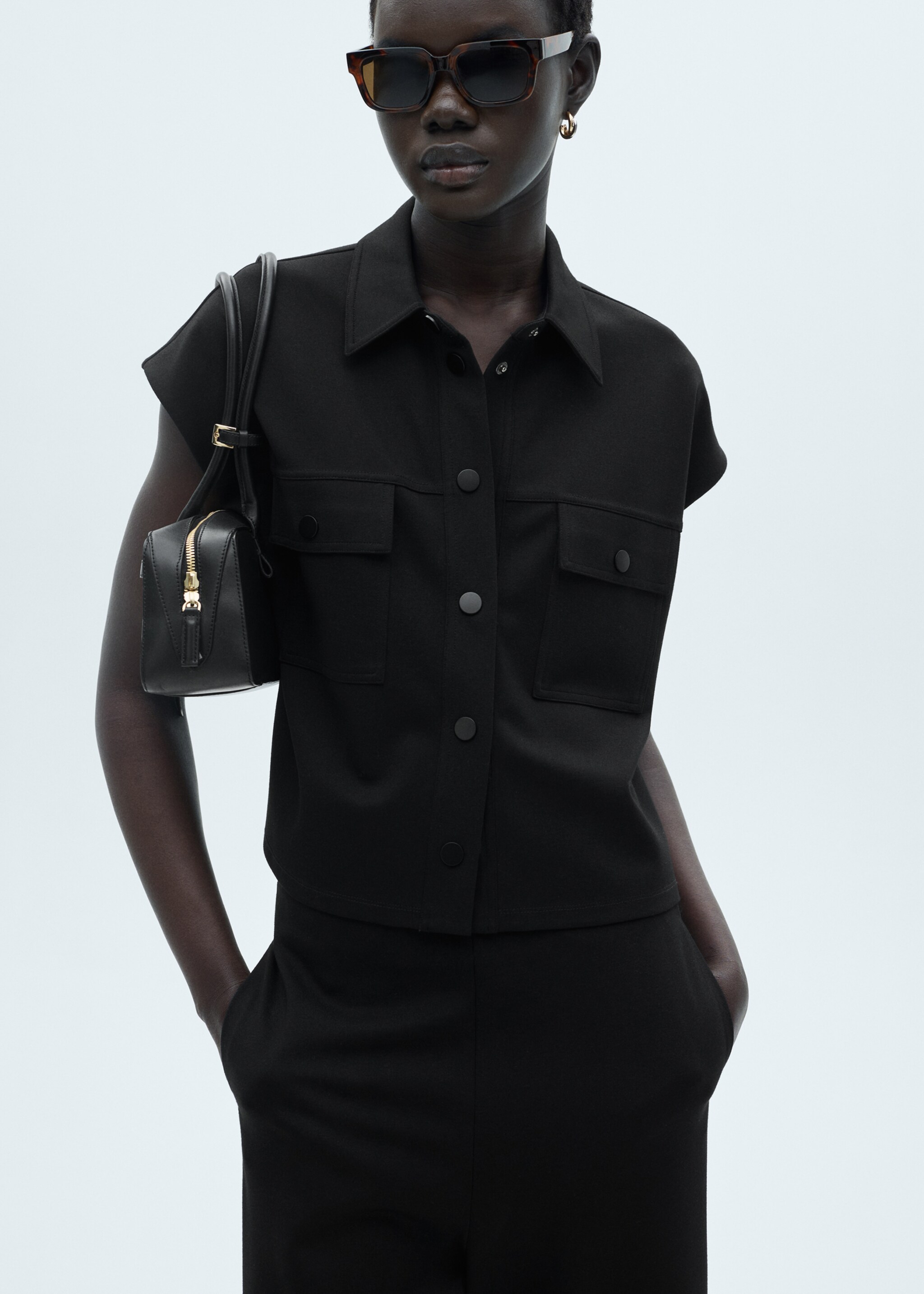 Knitted culotte trousers - Details of the article 1, Black. Ref: 77057652-00.