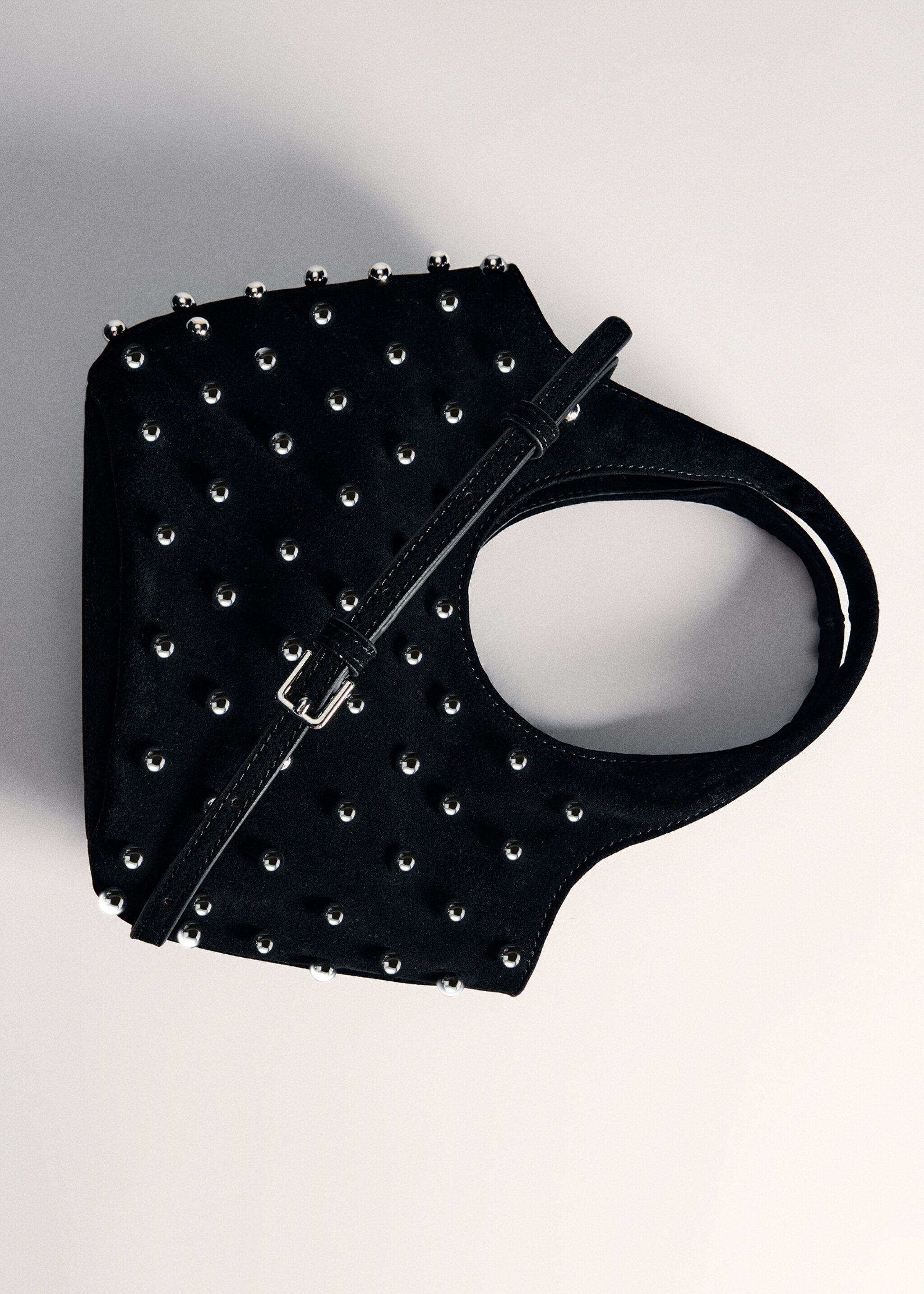Handbag with decorative studs - Details of the article 5, Black. Ref: 77057930-00.