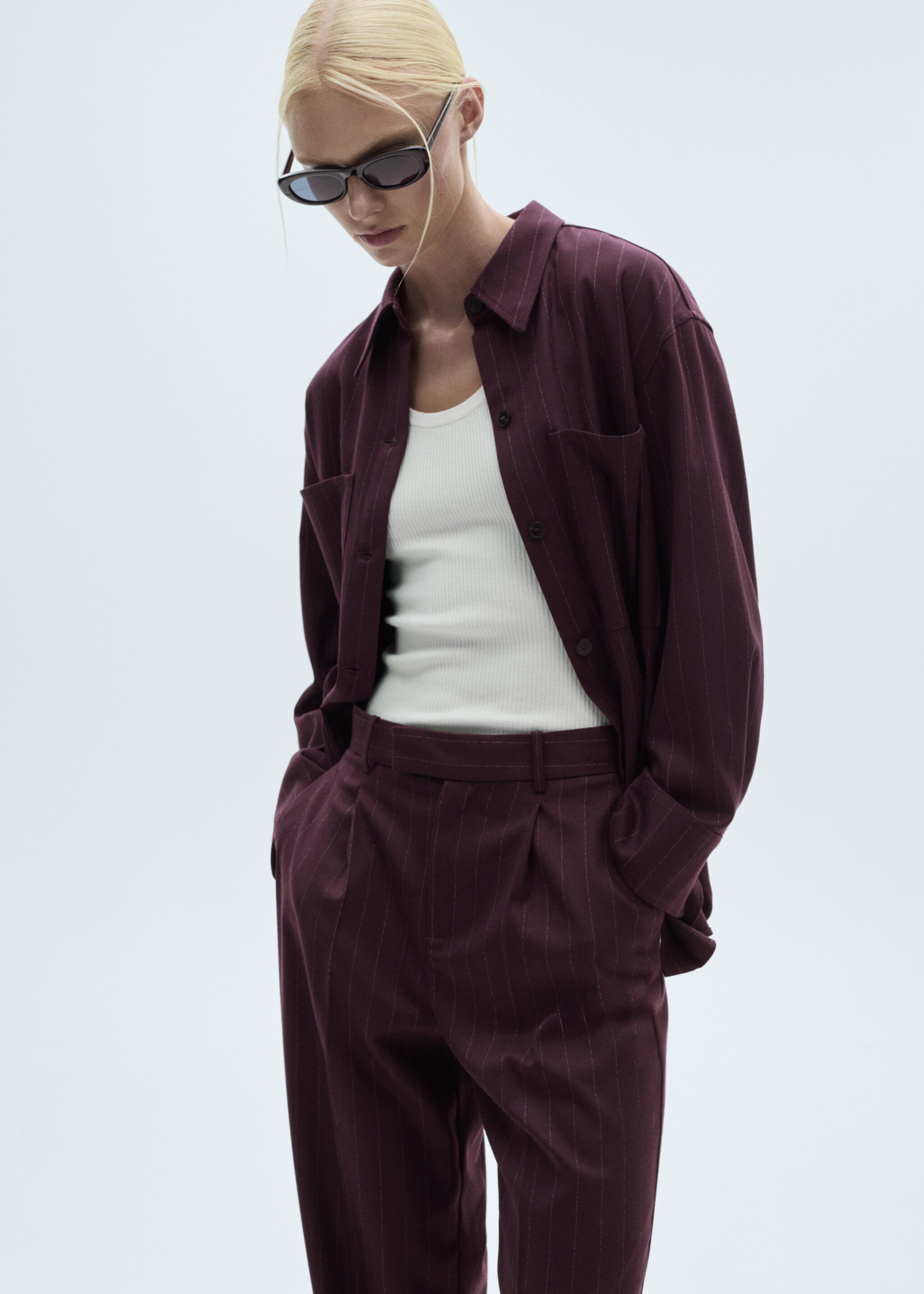 Pinstripe pleated trousers - Details of the article 1, Wine. Ref: 77058271-00.