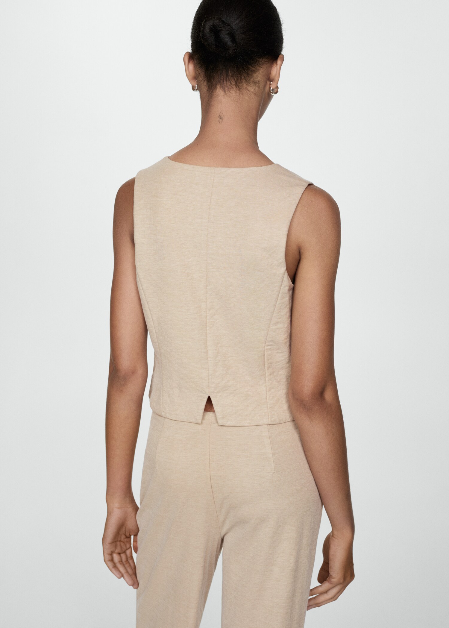 Gilet with buttons - Reverse of the article