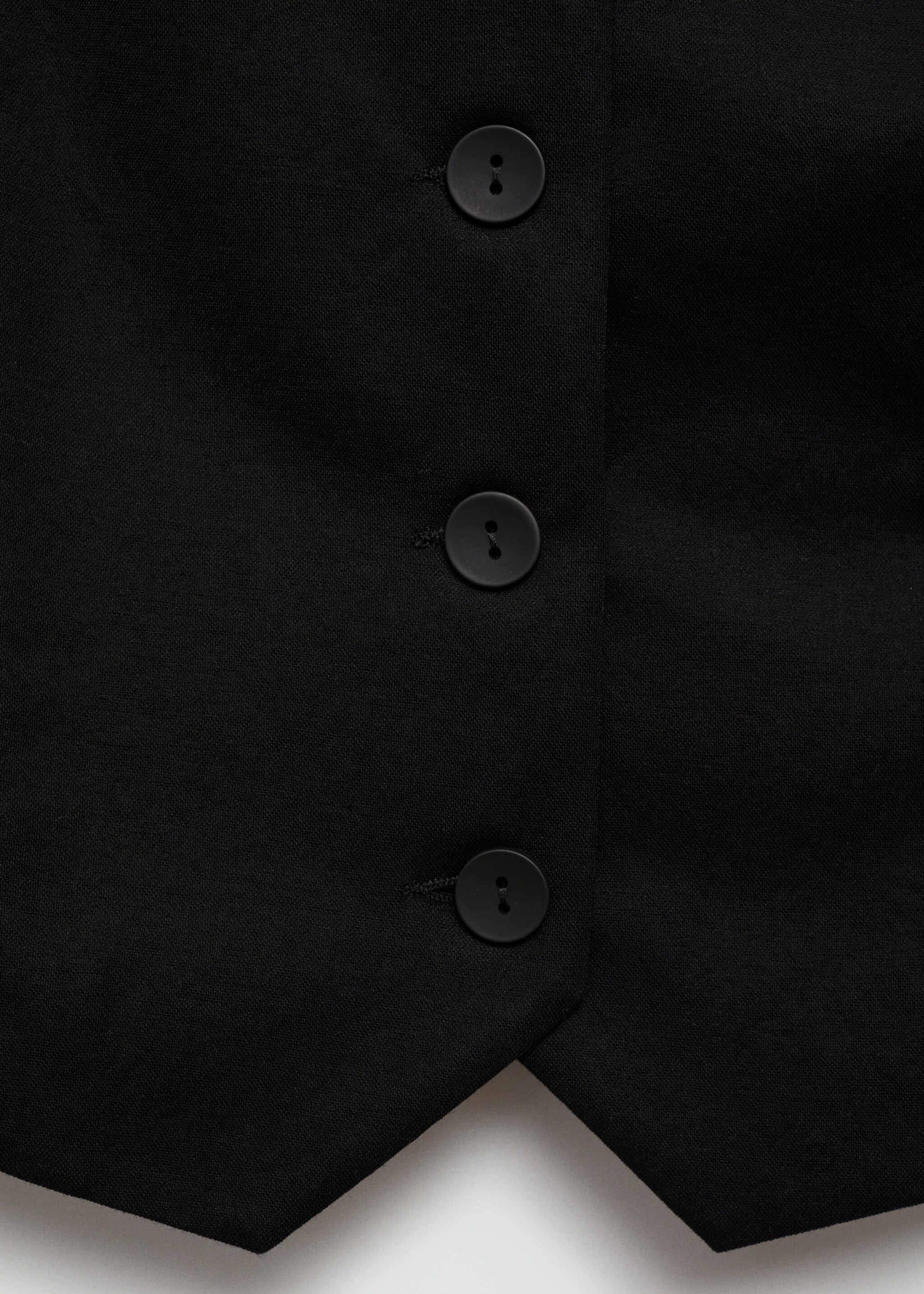 Gilet met knopen - Detail van het artikel 8