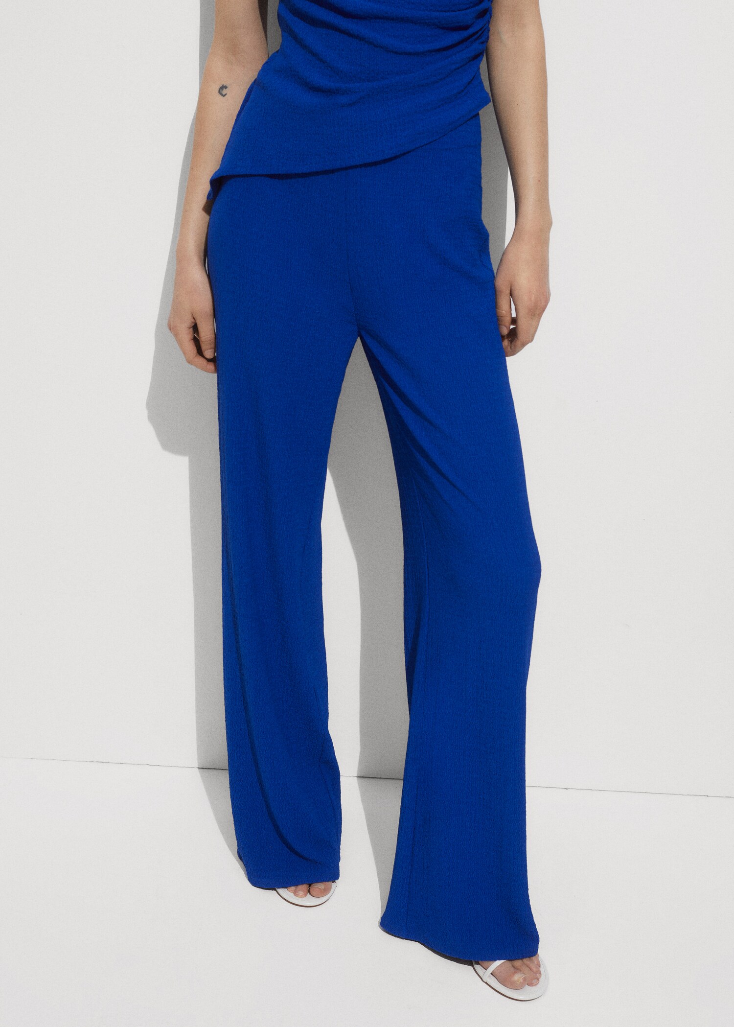 Flowy straight-fit byxor - Bild av mittparti