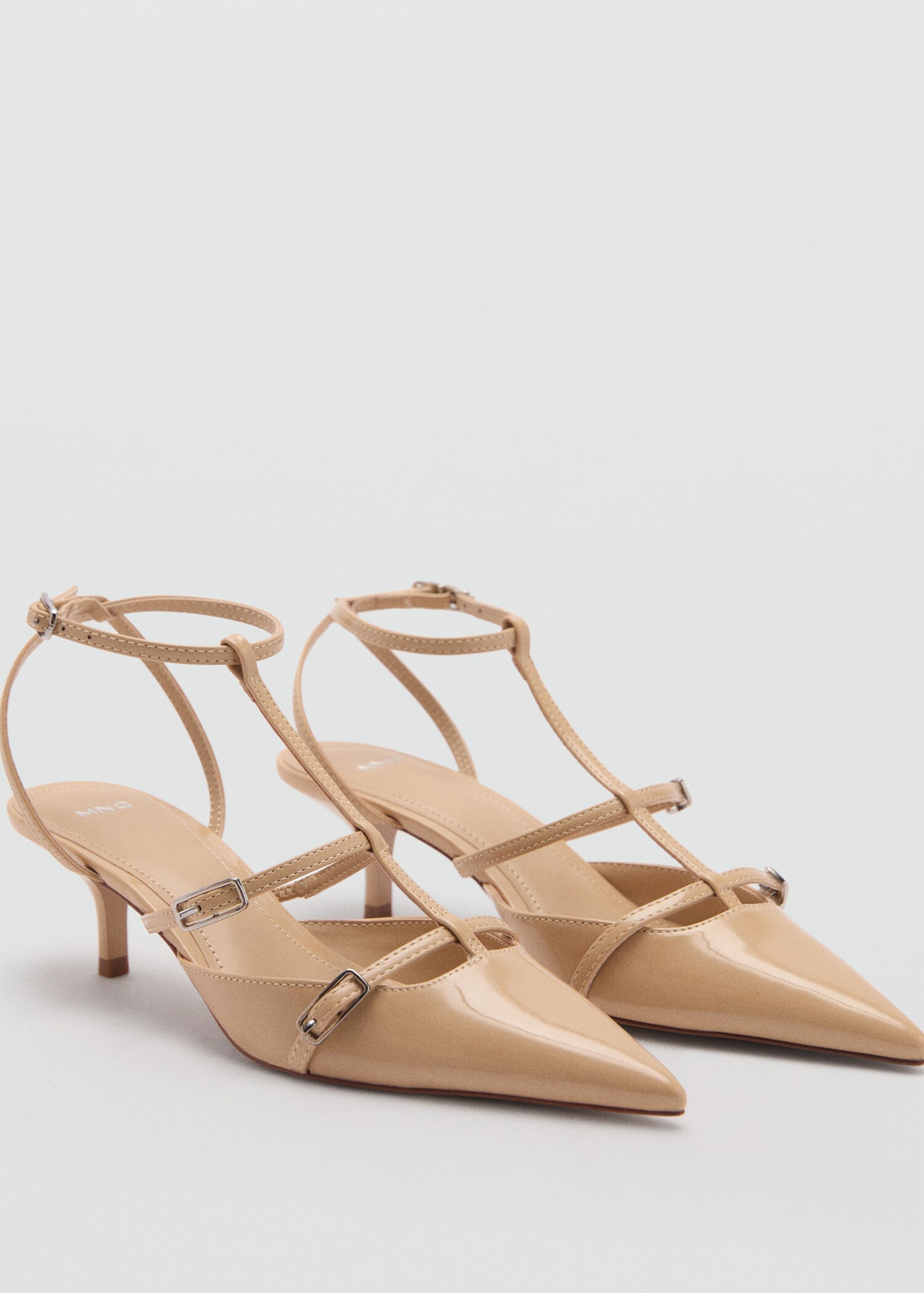 Heeled shoes with buckles - Medium plane