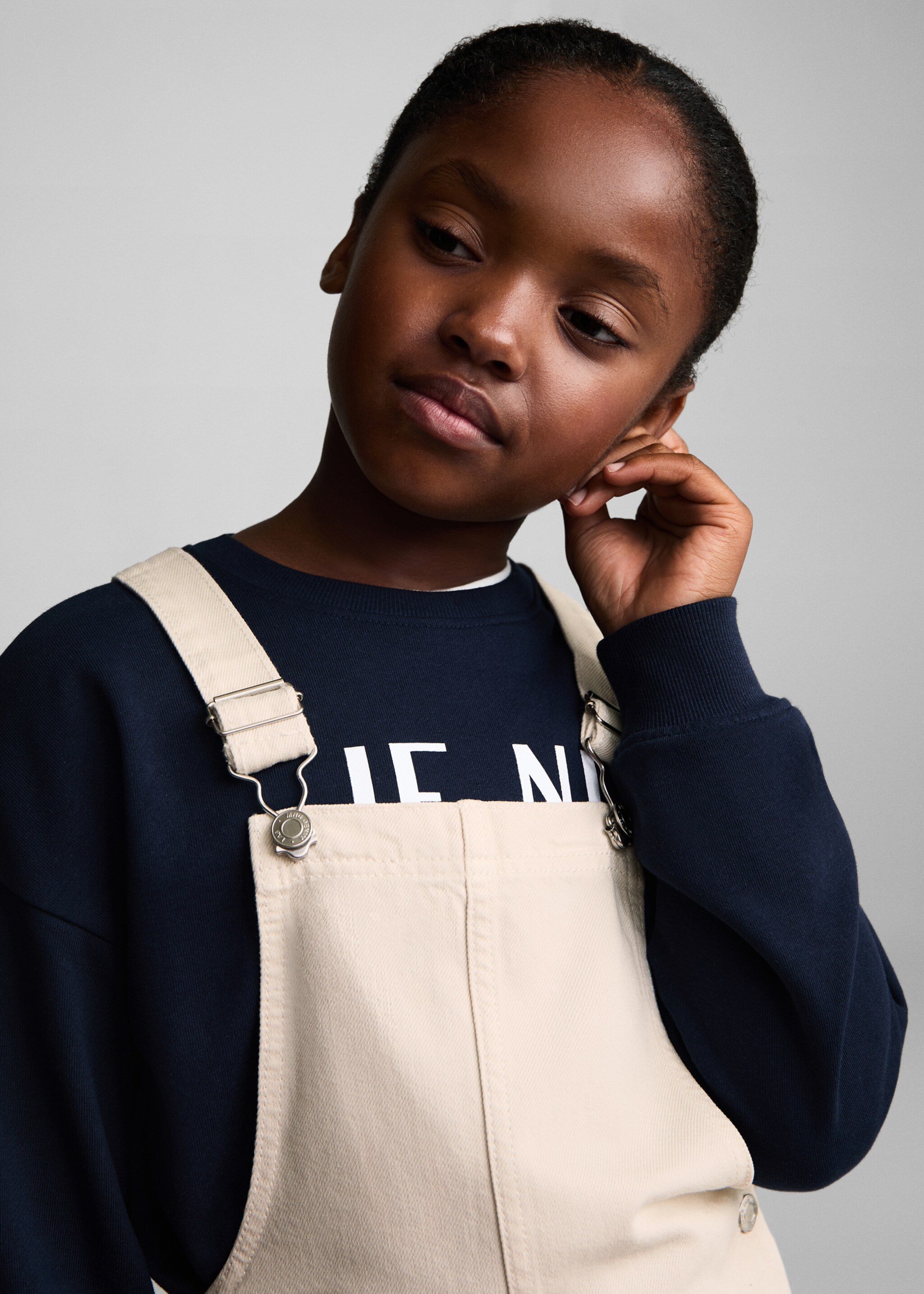 Short denim pinafore - Details of the article 1