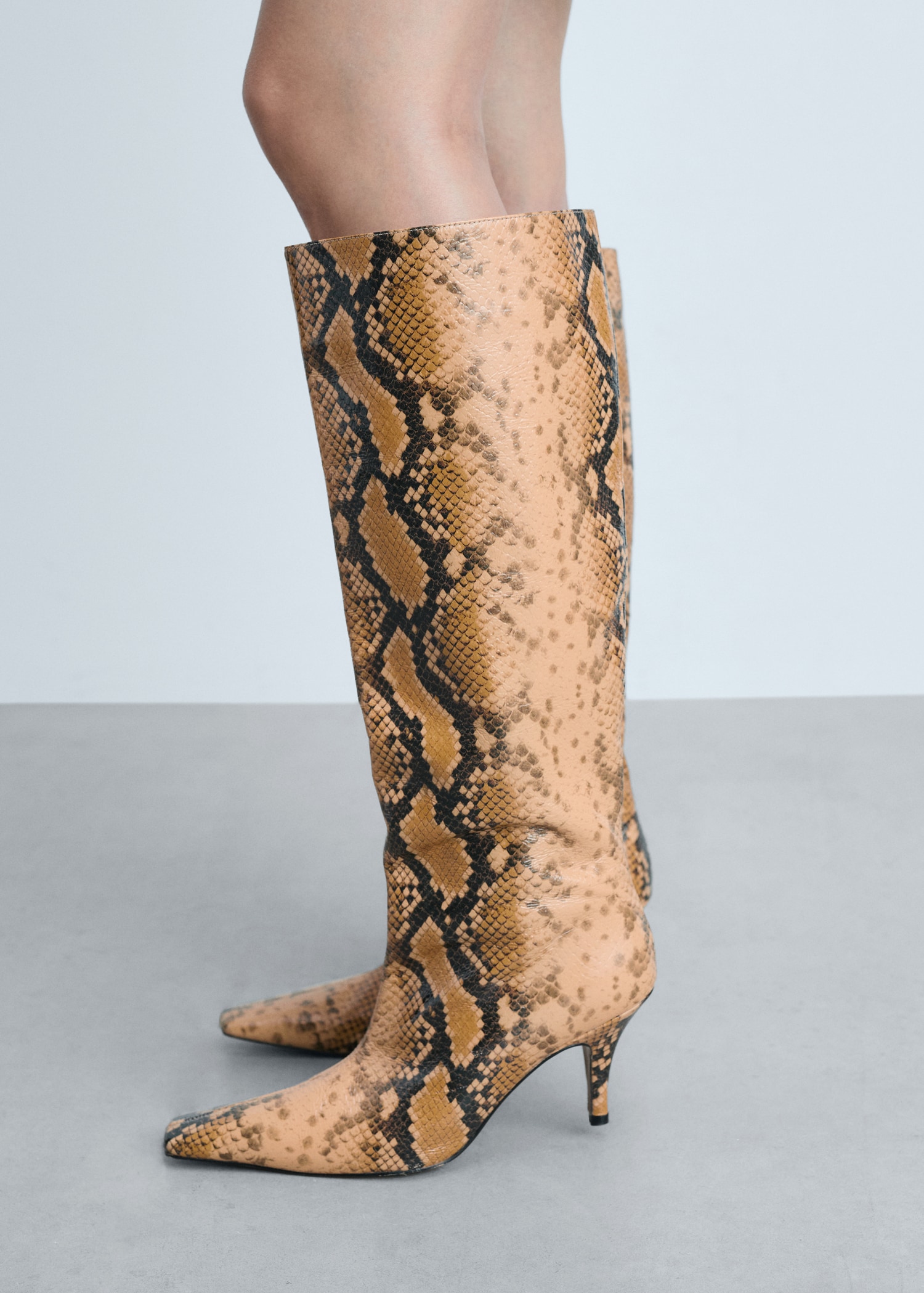 Knee-high leather boots with snake print Women MANGO OUTLET