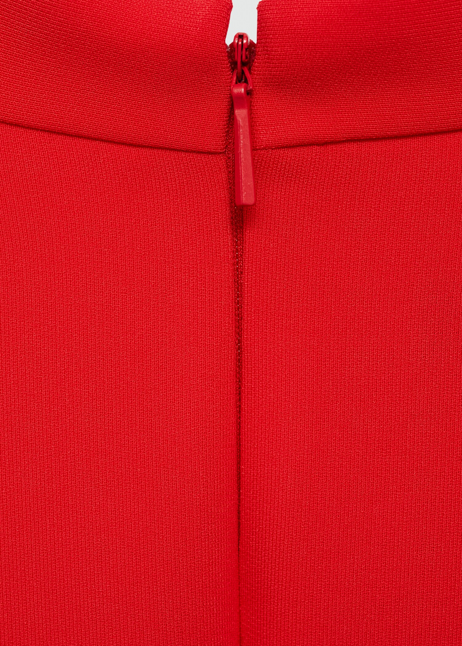 Dlouhý overal s detailem překřížení - Detail zboží 0