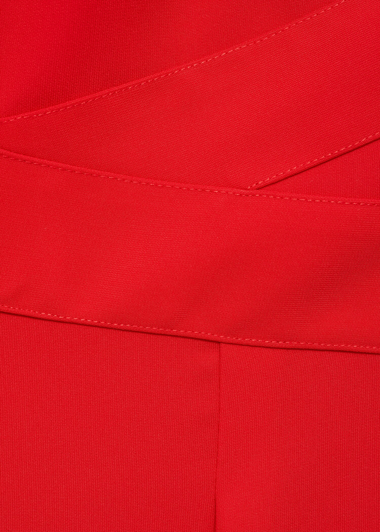 Dlouhý overal s detailem překřížení - Detail zboží 8