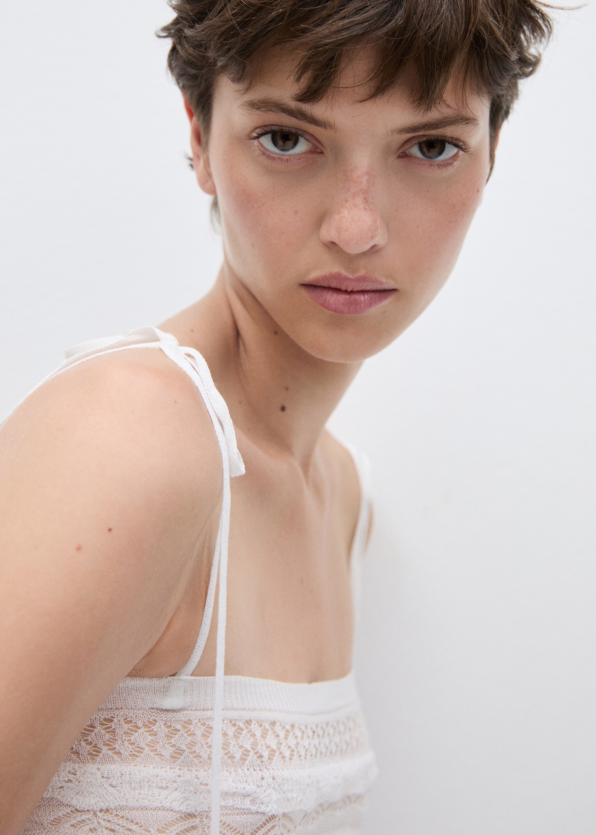 Openwork knit top - Details of the article 1, Ecru. Ref: 77064791-00.