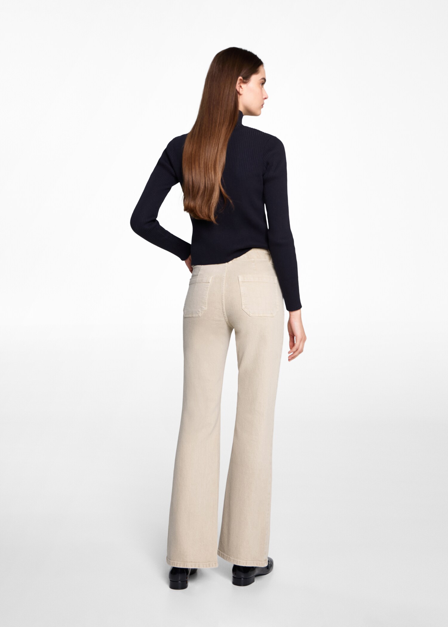 Jeans flare bolsillos - Reverso del artículo