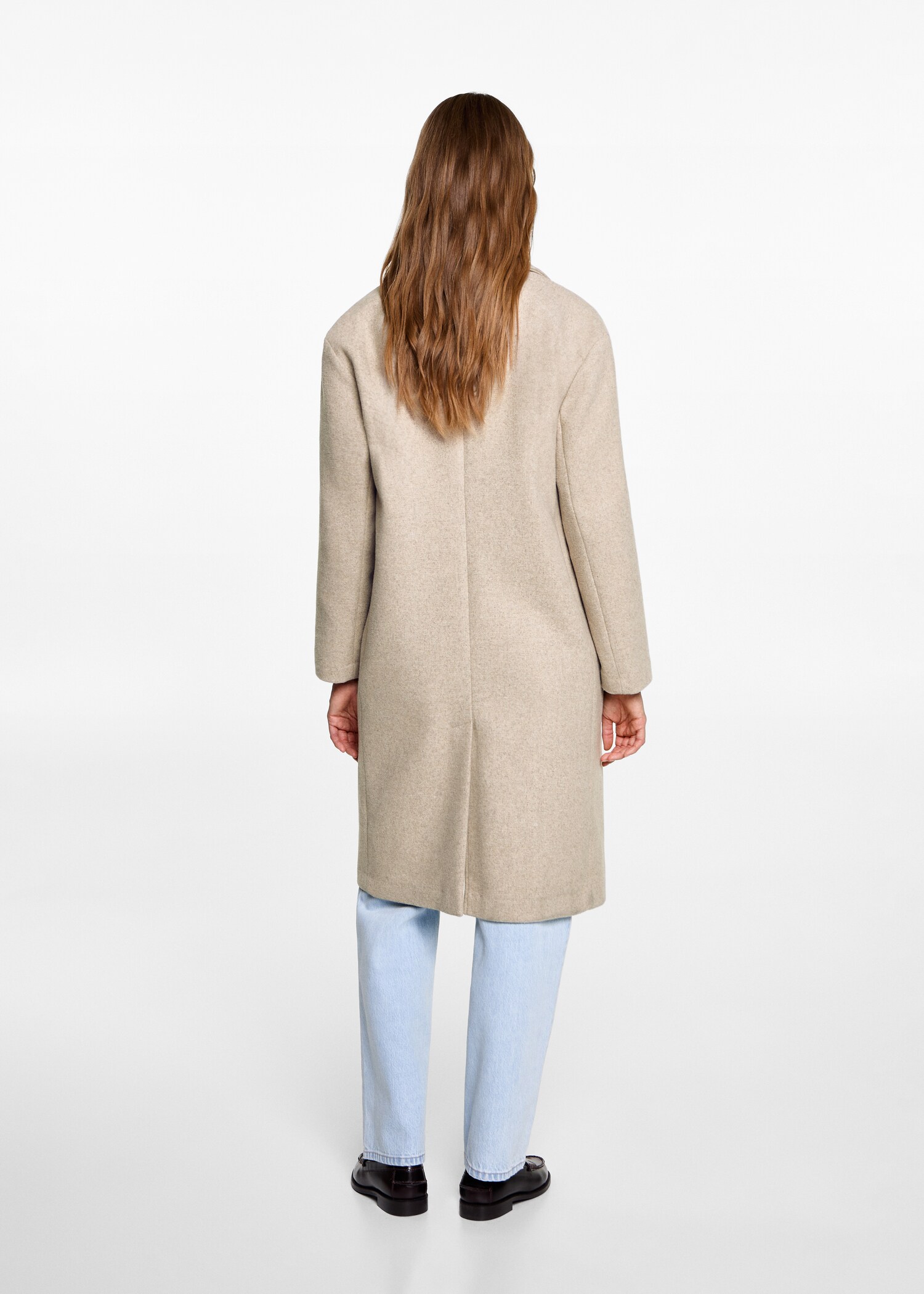 Handmade wool coat - Reverse of the article