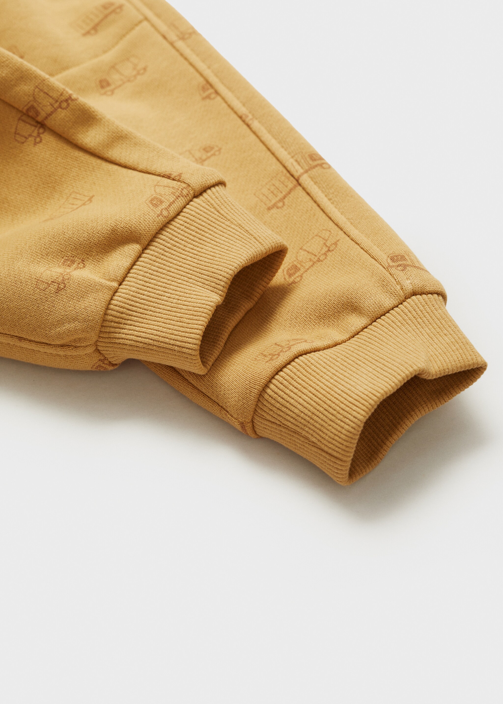 Kalhoty jogger s potiskem - Detail zboží 0, Okrová. Ref: 77067686-00.