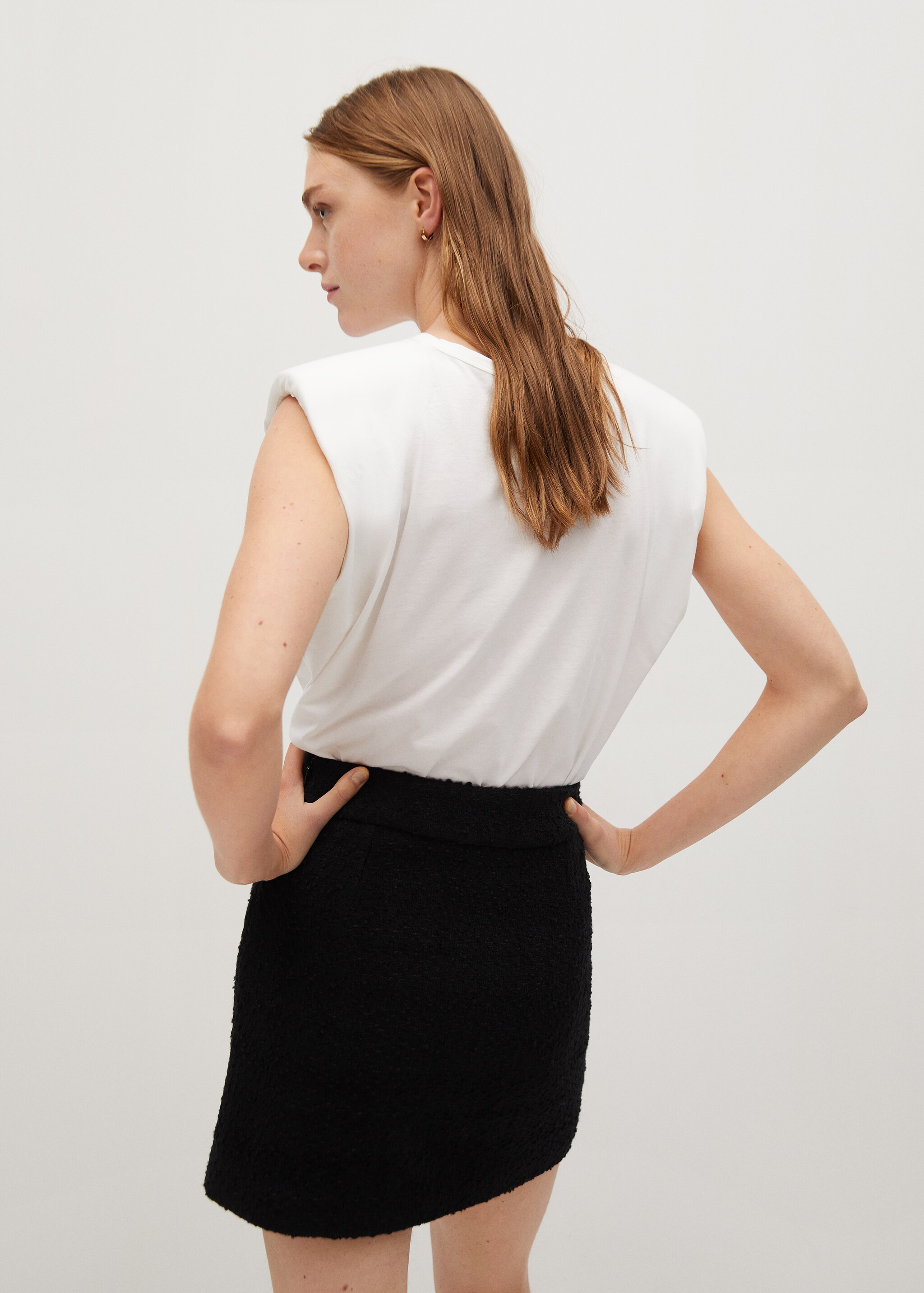 Tweed mini-skirt with chain - Reverse of the article
