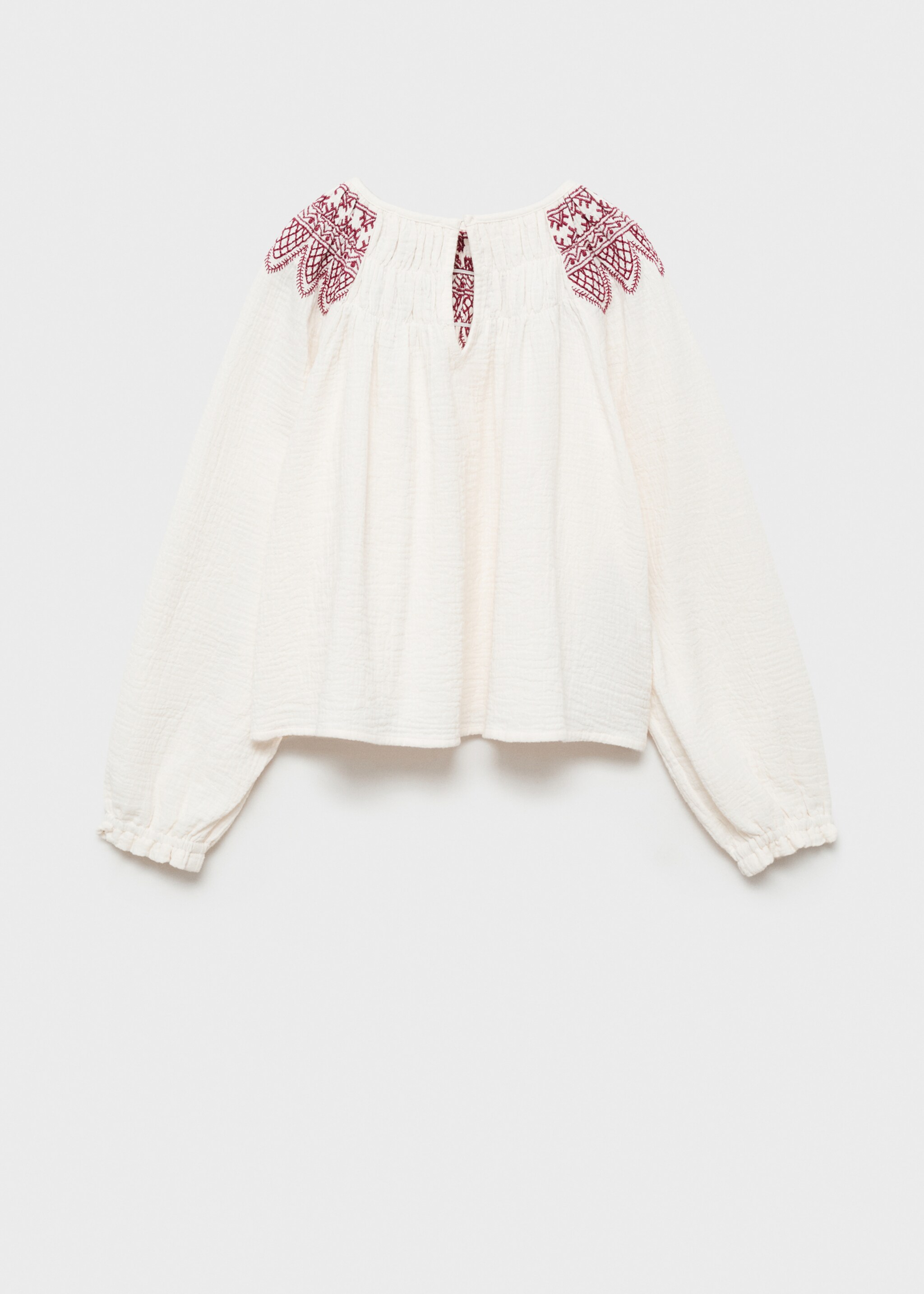 Blusa pormenores bordados - Verso do artigo