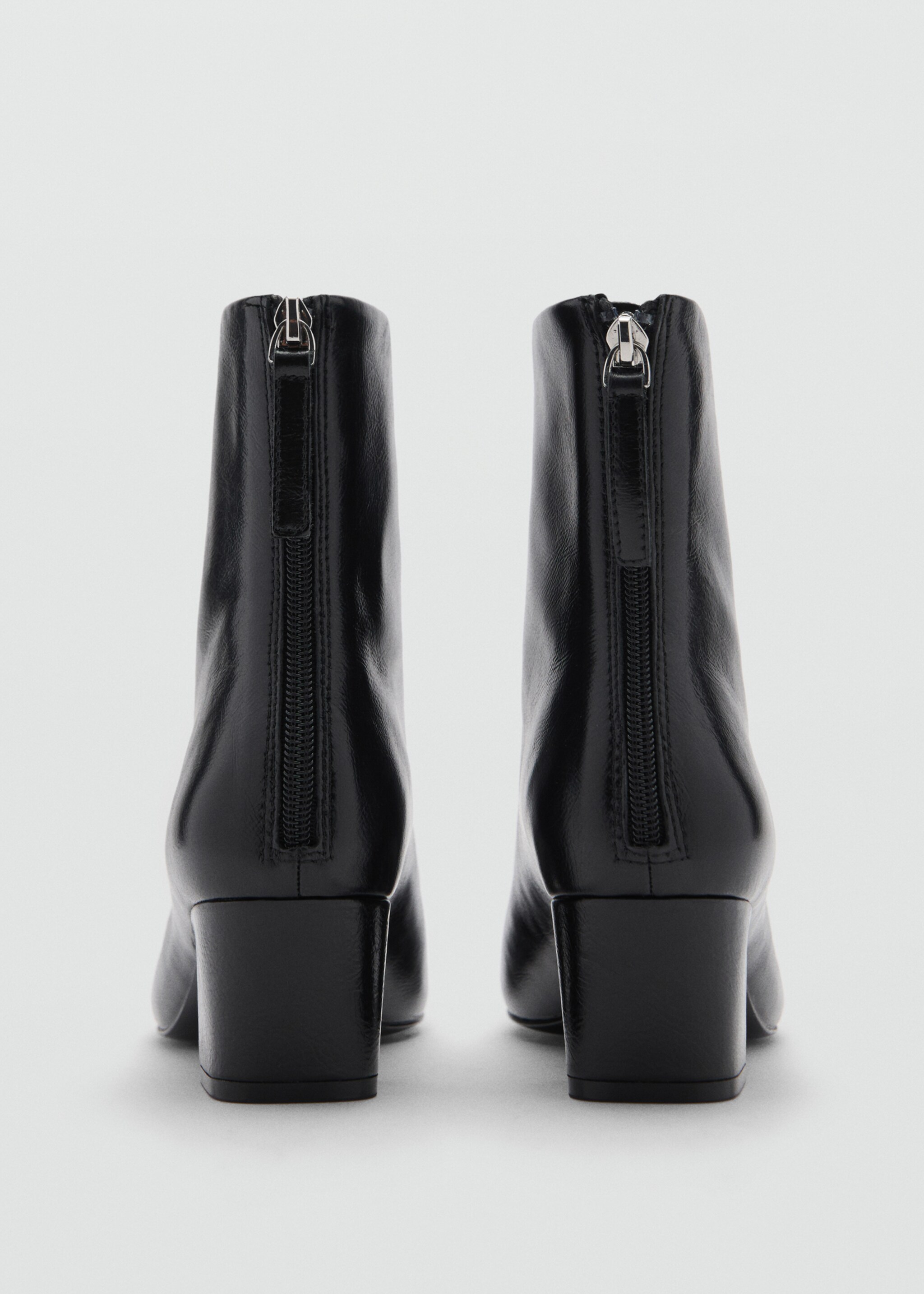 Bottines cuir zip - Détail de l'article 1, Noir. Ref: 77067930-00.